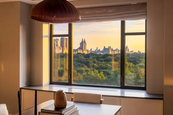 a view of a city from a dining room
