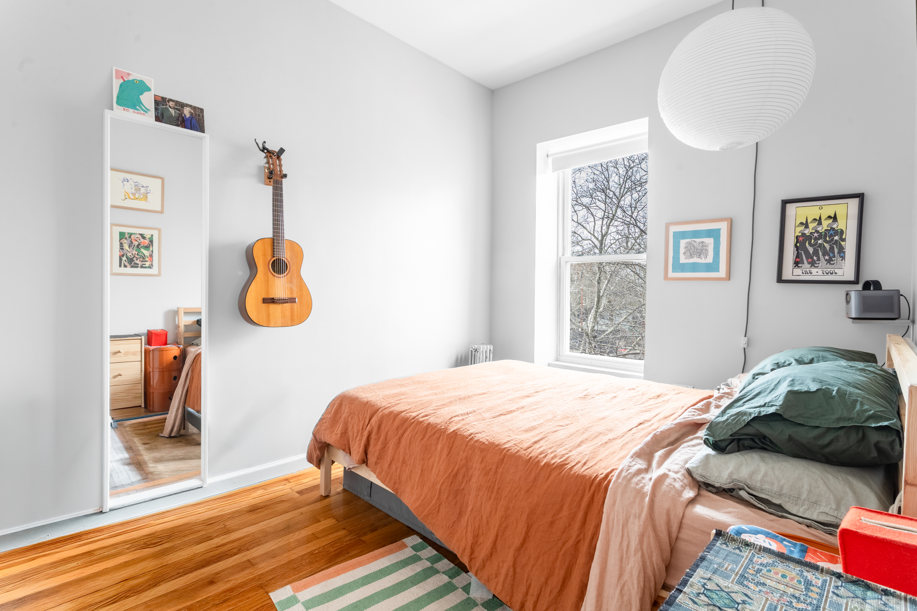 258 Halsey Street, Unit 3 Brooklyn, NY 11216 - Photo 7 of 10 a bedroom with a bed and a window