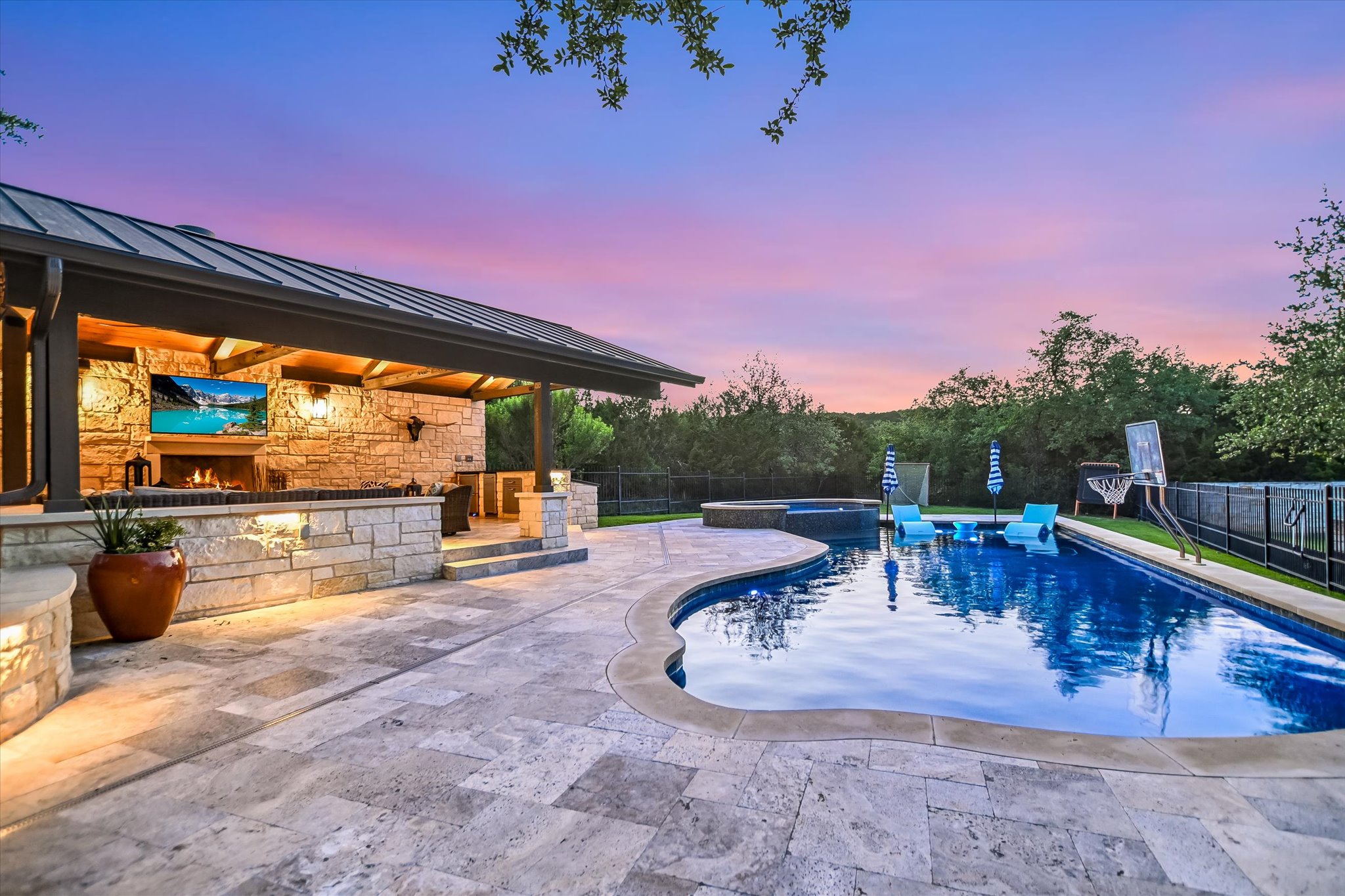 1422 Palomino Ridge Drive Austin, TX 78733 - Photo 53 of 60 a view of a swimming pool with a patio