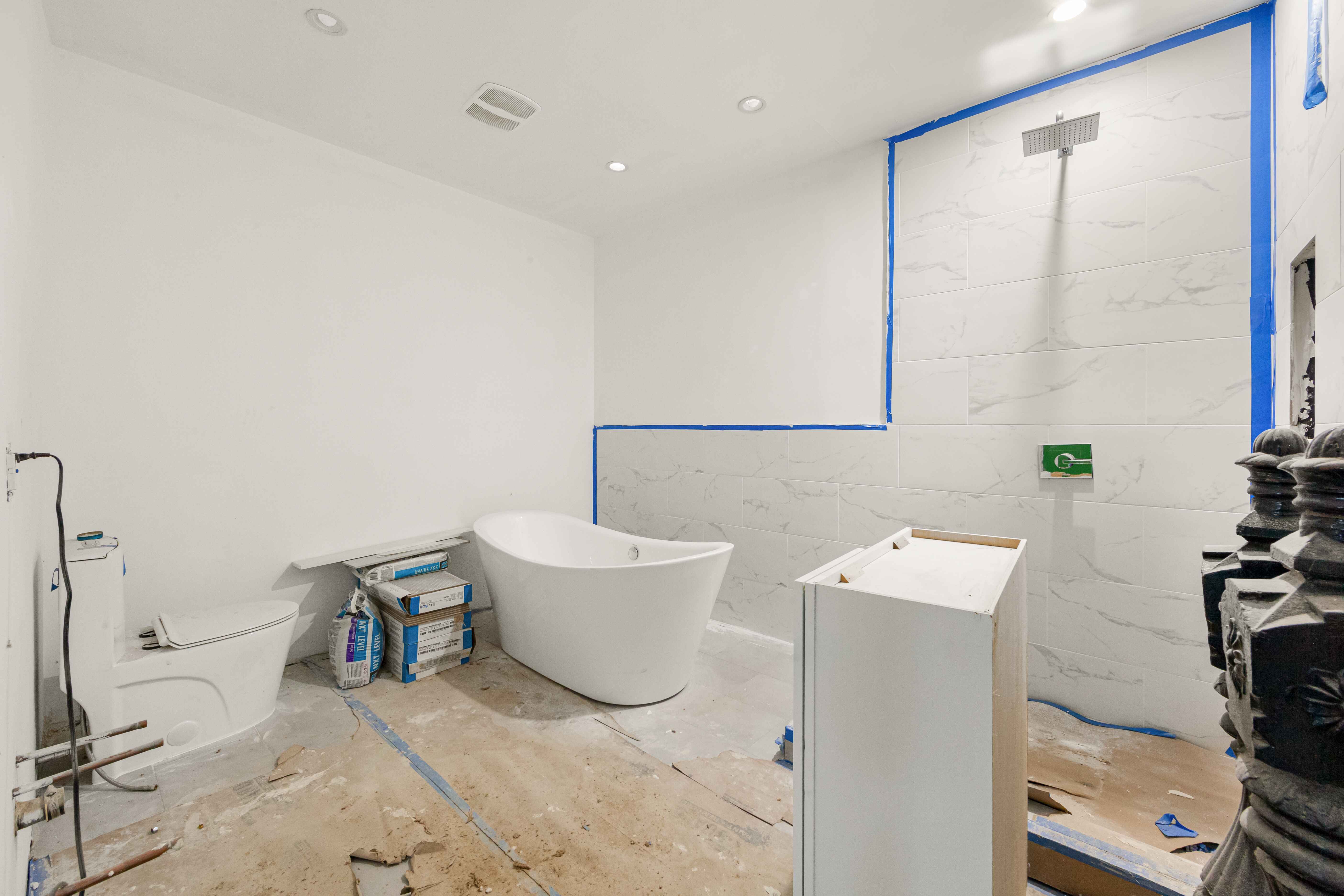 913 Lafayette Avenue Brooklyn, NY 11221 - Photo 6 of 19 a bathroom with a sink and a mirror