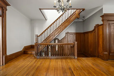 a view of entryway with wooden floor