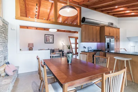 a view of a dining room with furniture