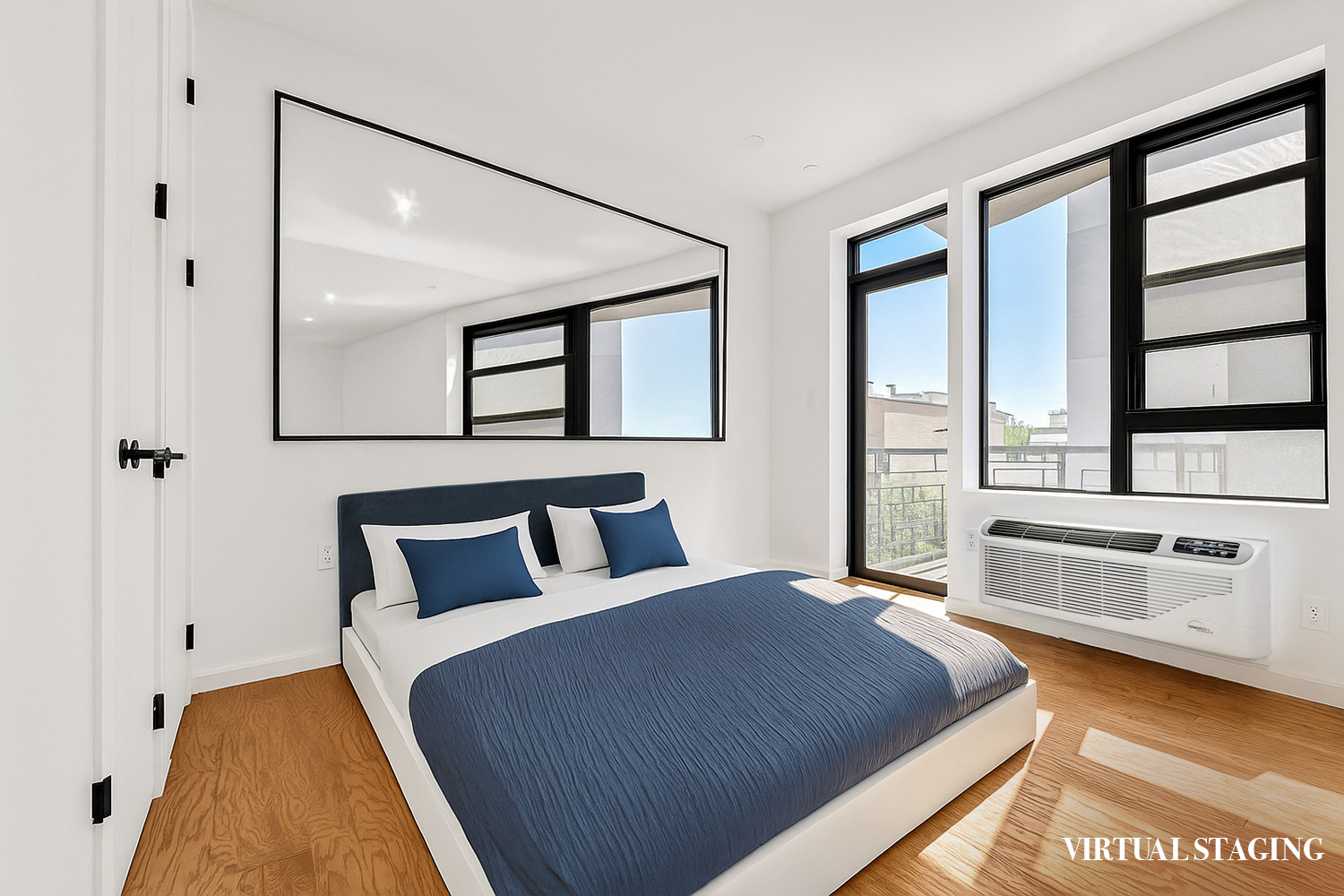 452 Lafayette Avenue, Unit 4R Brooklyn, NY 11205 - Photo 12 of 15 a bedroom with a large bed and a large window