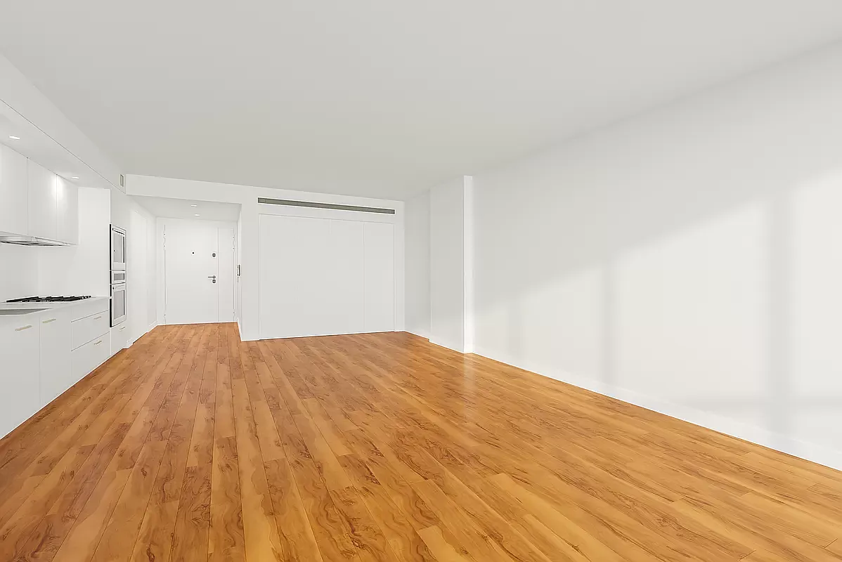 84 White Street, Unit 3A Manhattan, NY 10013 - Photo 4 of 6 a view of empty room with wooden floor