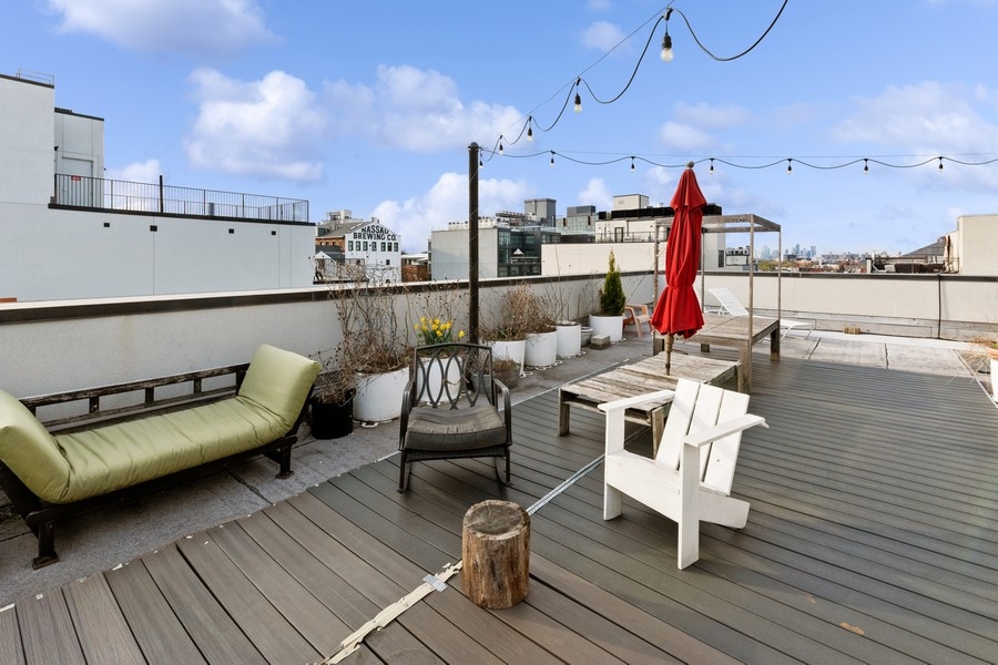 954 Bergen Street, Unit 4F Brooklyn, NY 11216 - Photo 7 of 11 a view of a terrace with seating area