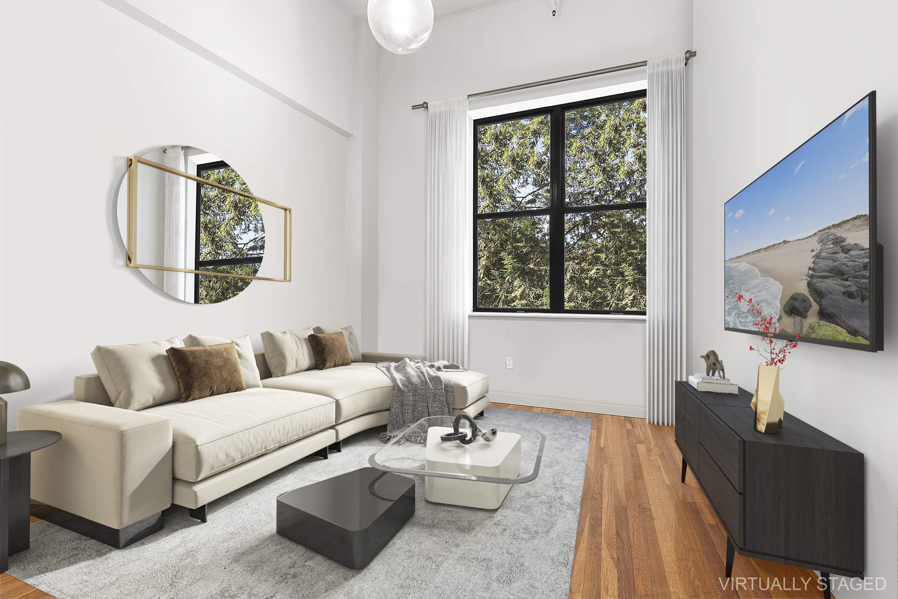 a living room with furniture and a flat screen tv