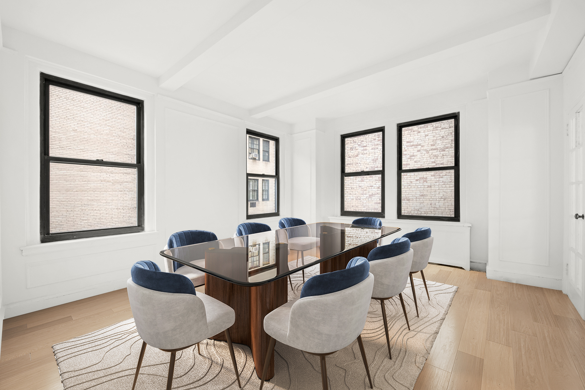 55 East 72nd Street, Unit 2NORTH Manhattan, NY 10021 - Photo 5 of 18 a view of a dining room with furniture and windows