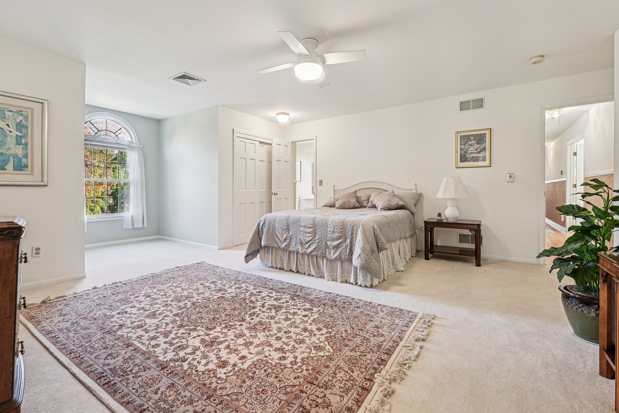 905 Kip Lane Neshanic Station, NJ 08853 - Photo 30 of 50 a bedroom with a large bed and a couch