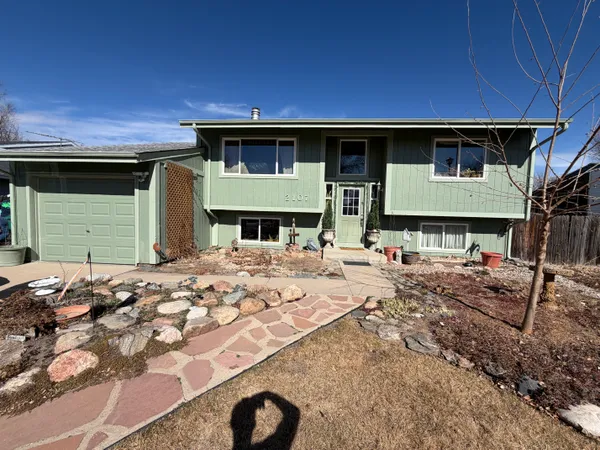 a view of a house with a patio