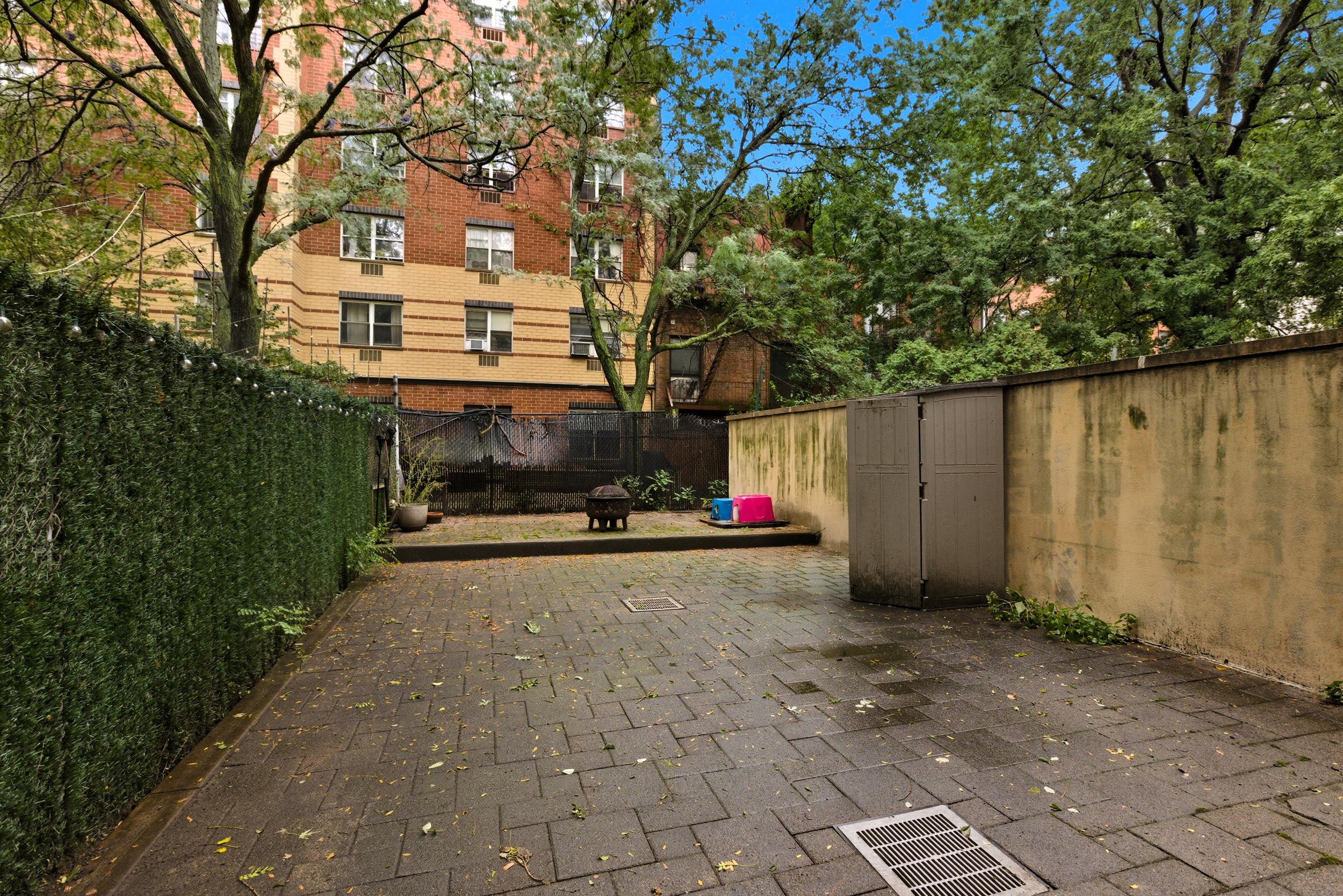 a view of street and sign on the side of the road