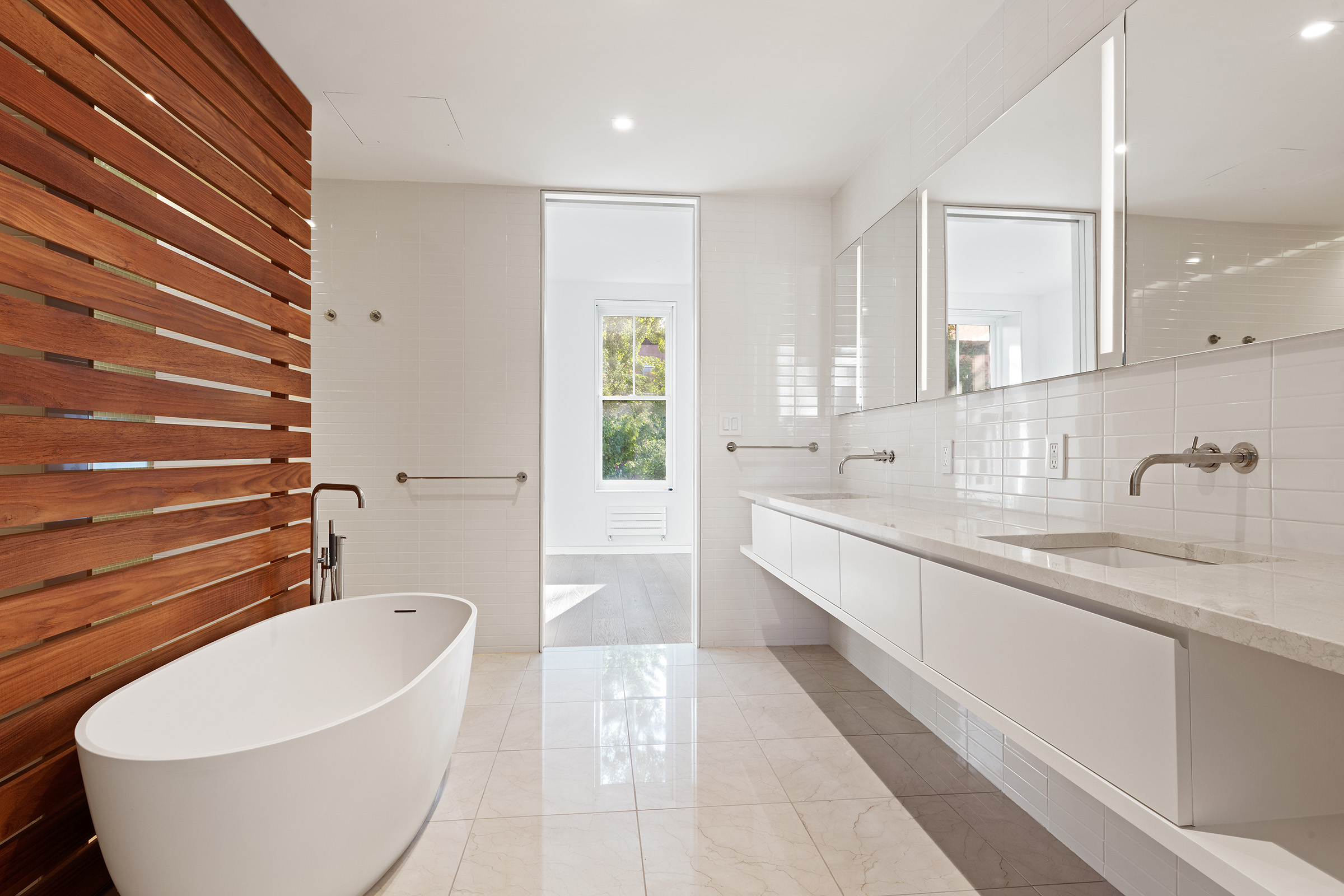 369 Union Street Brooklyn, NY 11231 - Photo 9 of 21 a spacious bathroom with a bathtub and a sink