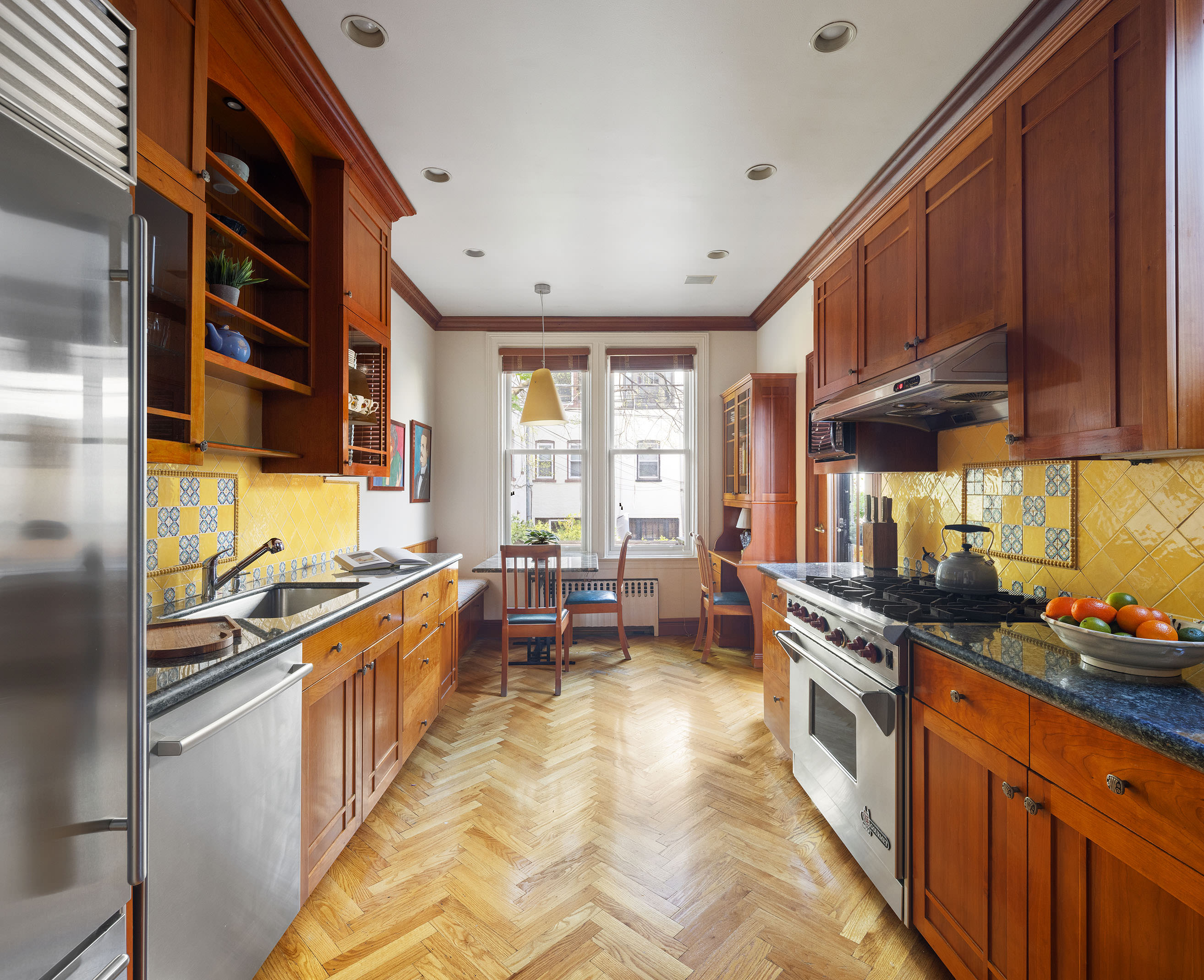 577 4th Street Brooklyn, NY 11215 - Photo 6 of 22 a kitchen with stainless steel appliances granite countertop a stove a sink and a refrigerator