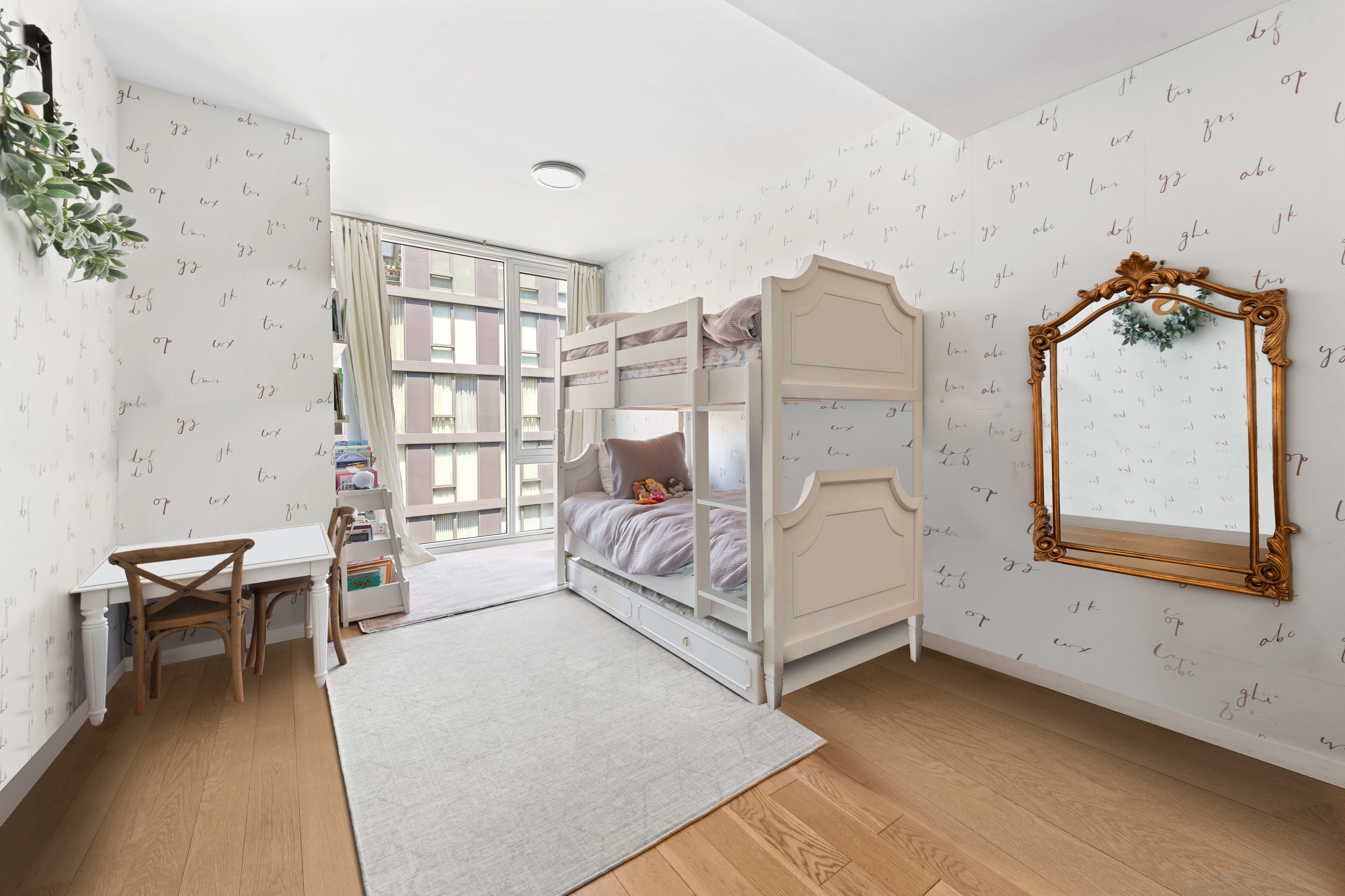 540 West 49th Street, Unit 401S Manhattan, NY 10019 - Photo 8 of 14 a bedroom with a bed and a window