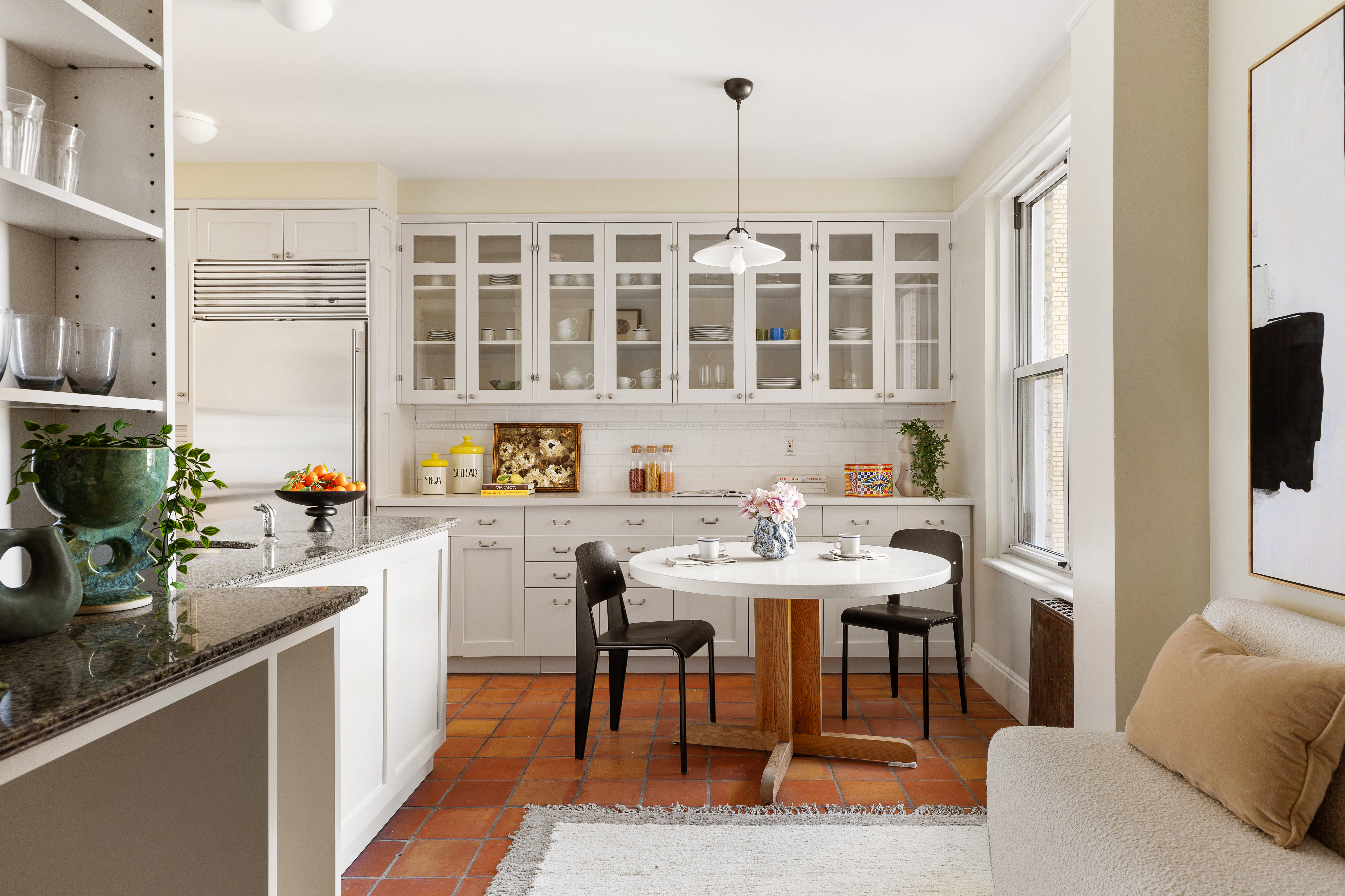 35 Prospect Park West, Unit 10B Brooklyn, NY 11215 - Photo 7 of 19 a kitchen with a sink and chairs