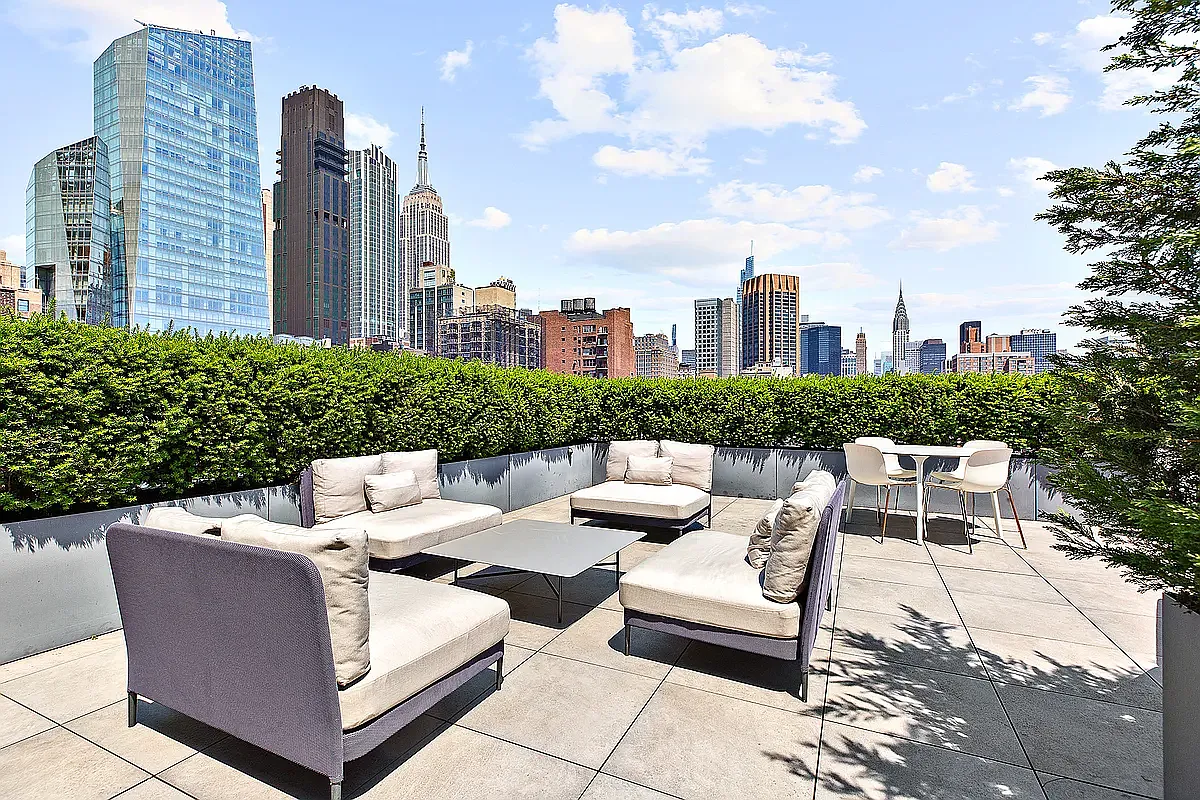 88 Lexington Avenue, Unit 802 Manhattan, NY 10016 - Photo 13 of 22 a view of a terrace with couches and a table