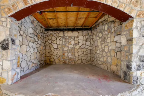 a view of a room with wooden walls