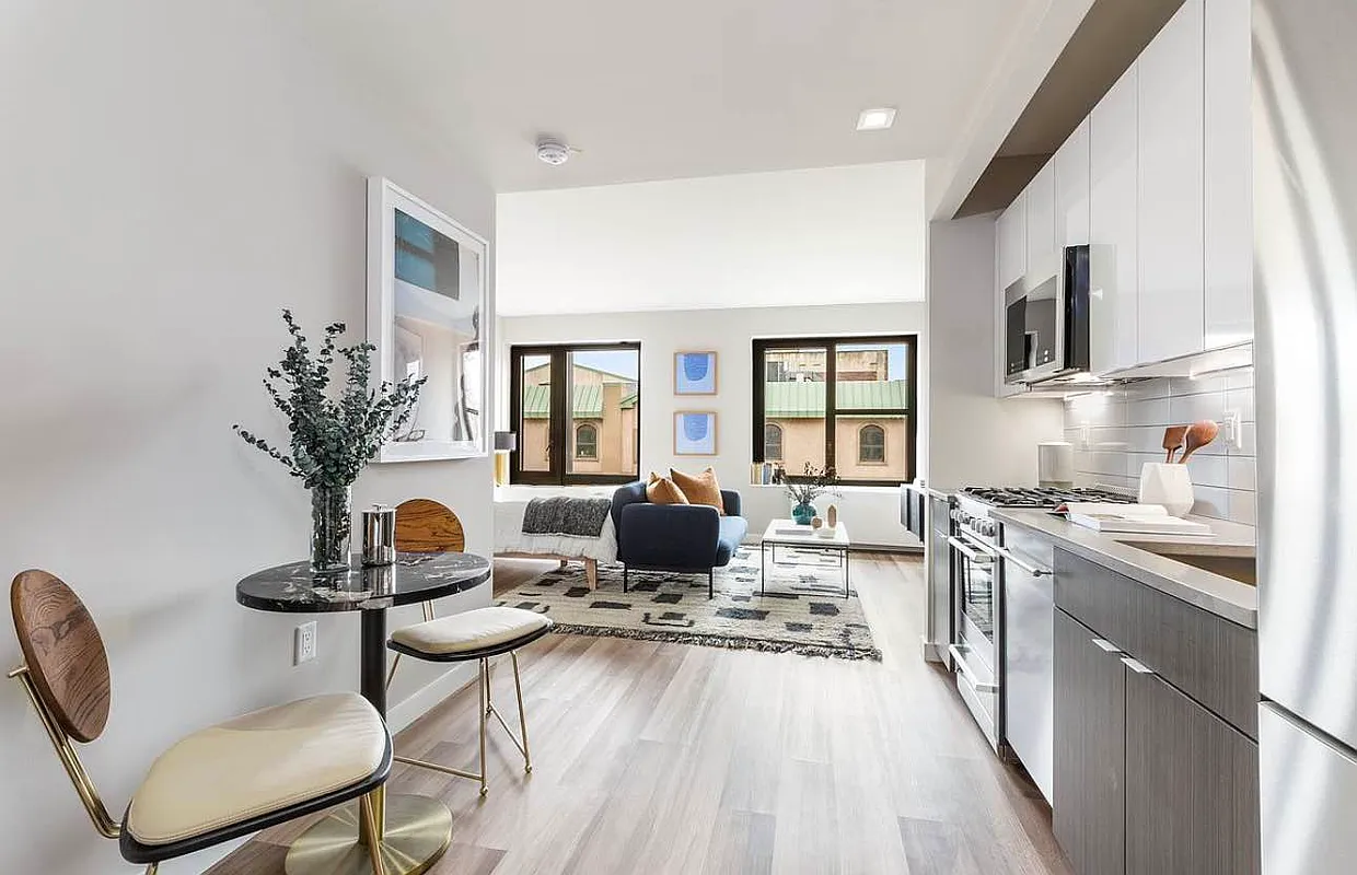 2415 Church Avenue, Unit 204 Brooklyn, NY 11226 - Photo 2 of 5 a kitchen with a refrigerator and a stove