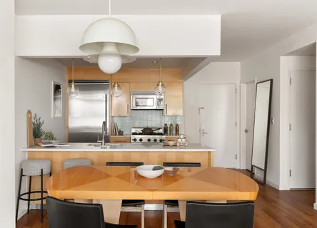 a kitchen with stainless steel appliances granite countertop a sink and a stove