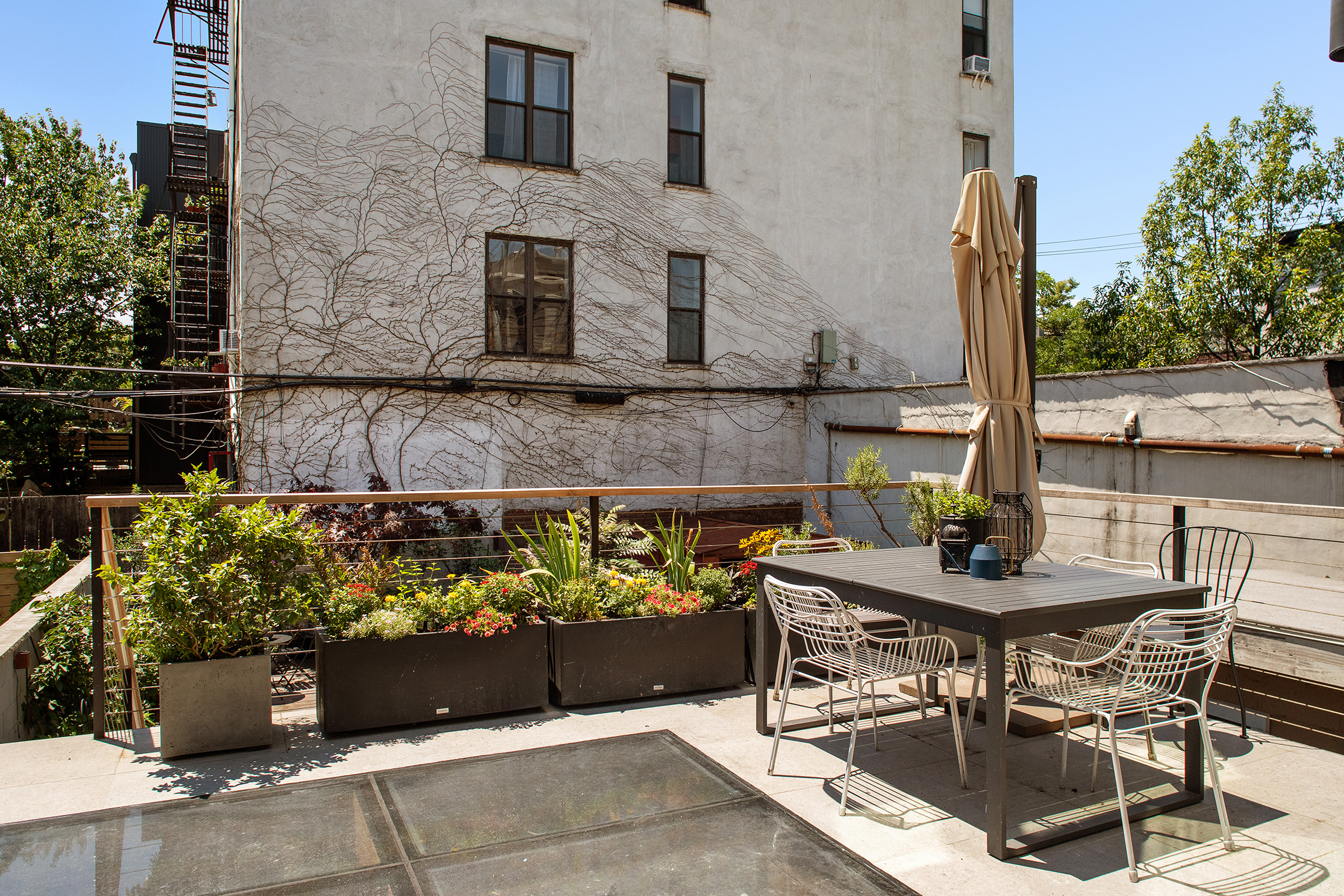 47 Wolcott Street Brooklyn, NY 11231 - Photo 15 of 24 a view of outdoor kitchen with seating area
