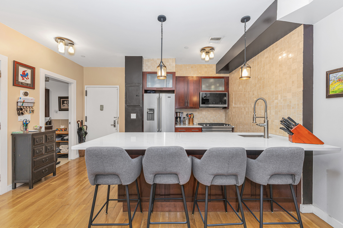 319 Humboldt Street, Unit 1B Brooklyn, NY 11211 - Photo 8 of 17 a view of a dining room with furniture