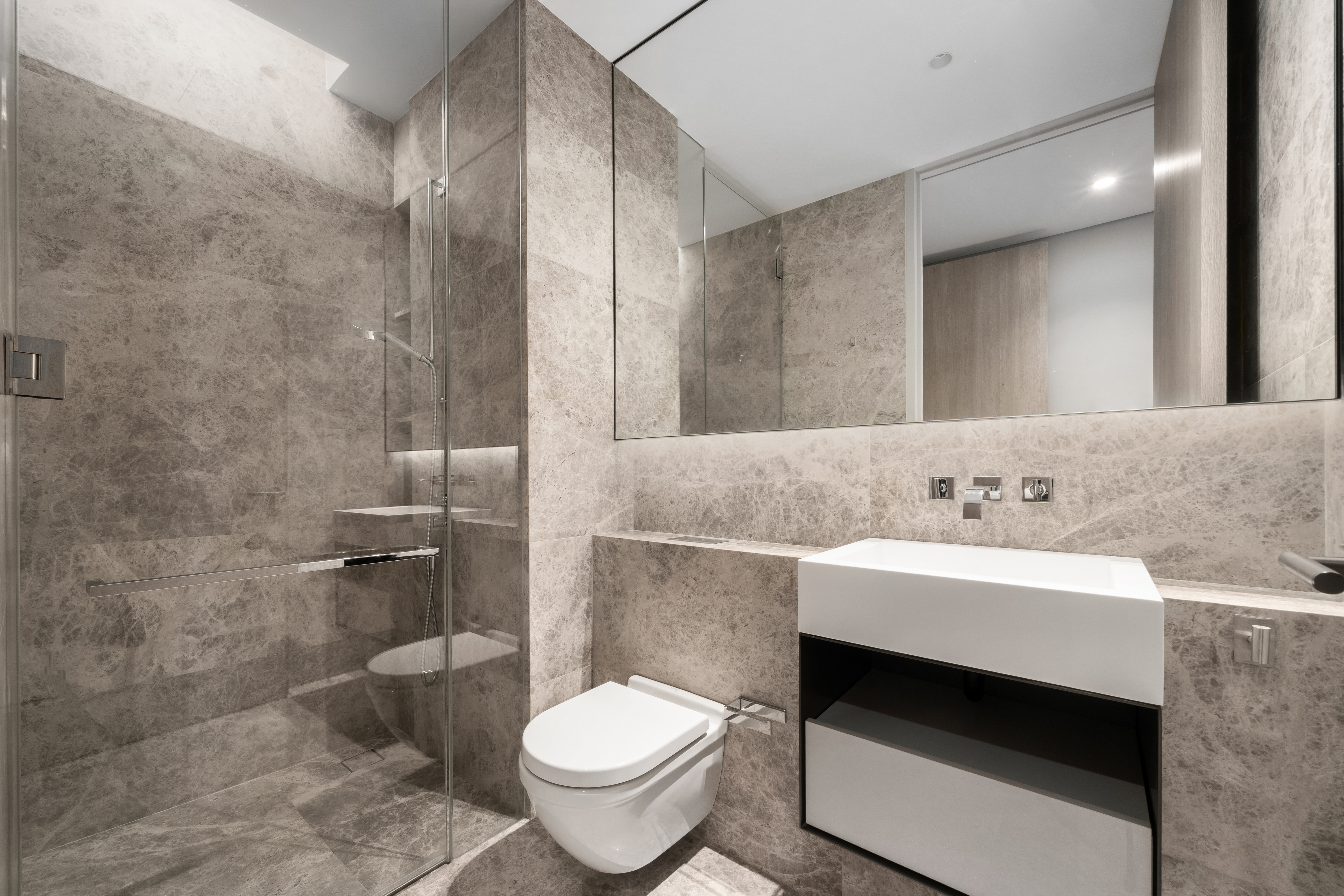 522 West 29th Street, Unit 7D Manhattan, NY 10001 - Photo 16 of 17 a bathroom with a sink and a mirror