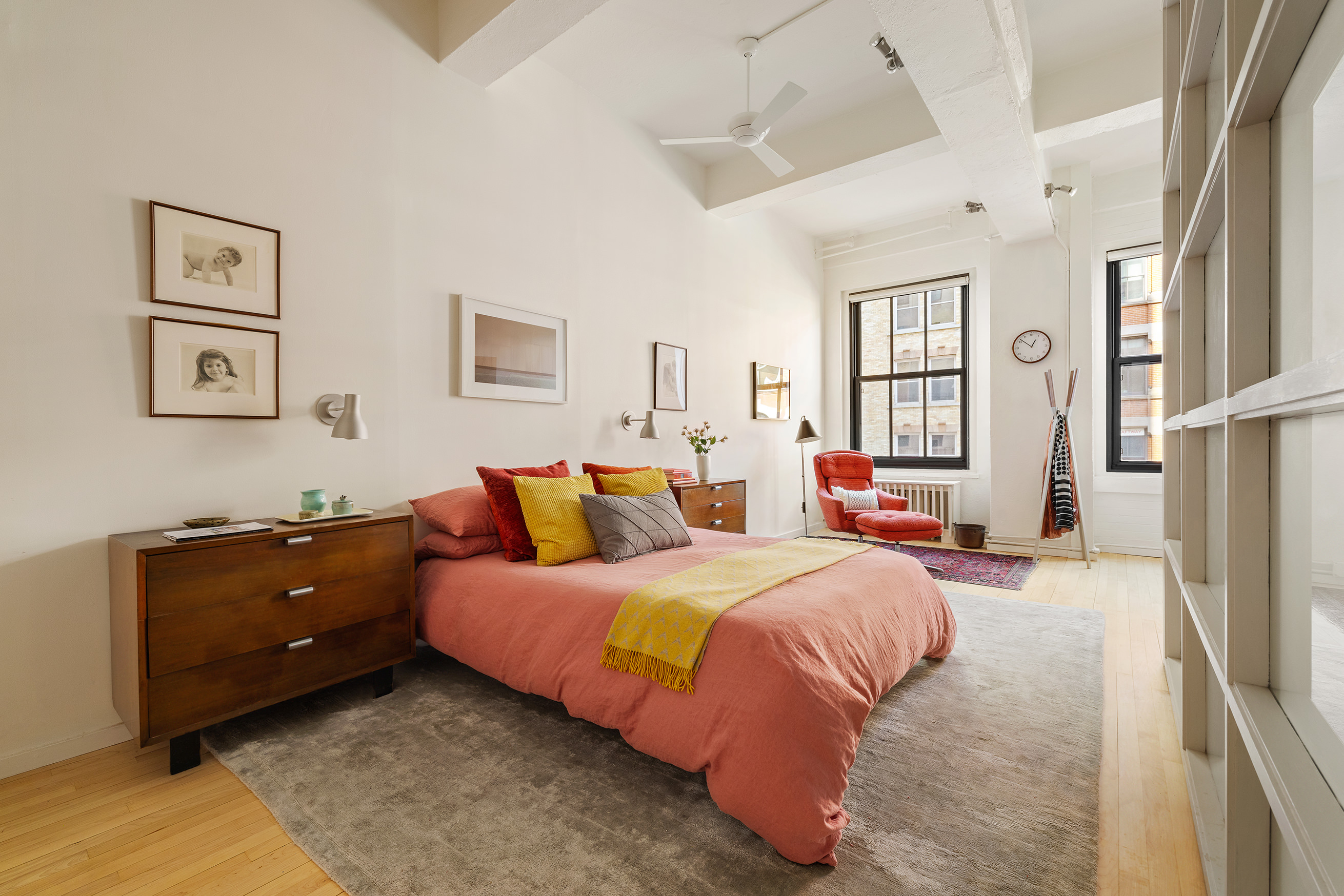20 Jay Street, Unit 2/3C Manhattan, NY 10013 - Photo 8 of 16 a bedroom with a bed dresser and a window