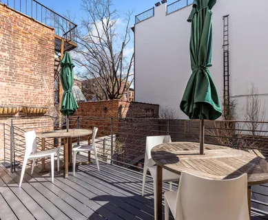 a table and chairs in the terrace