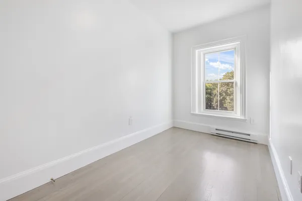 an empty room with a window