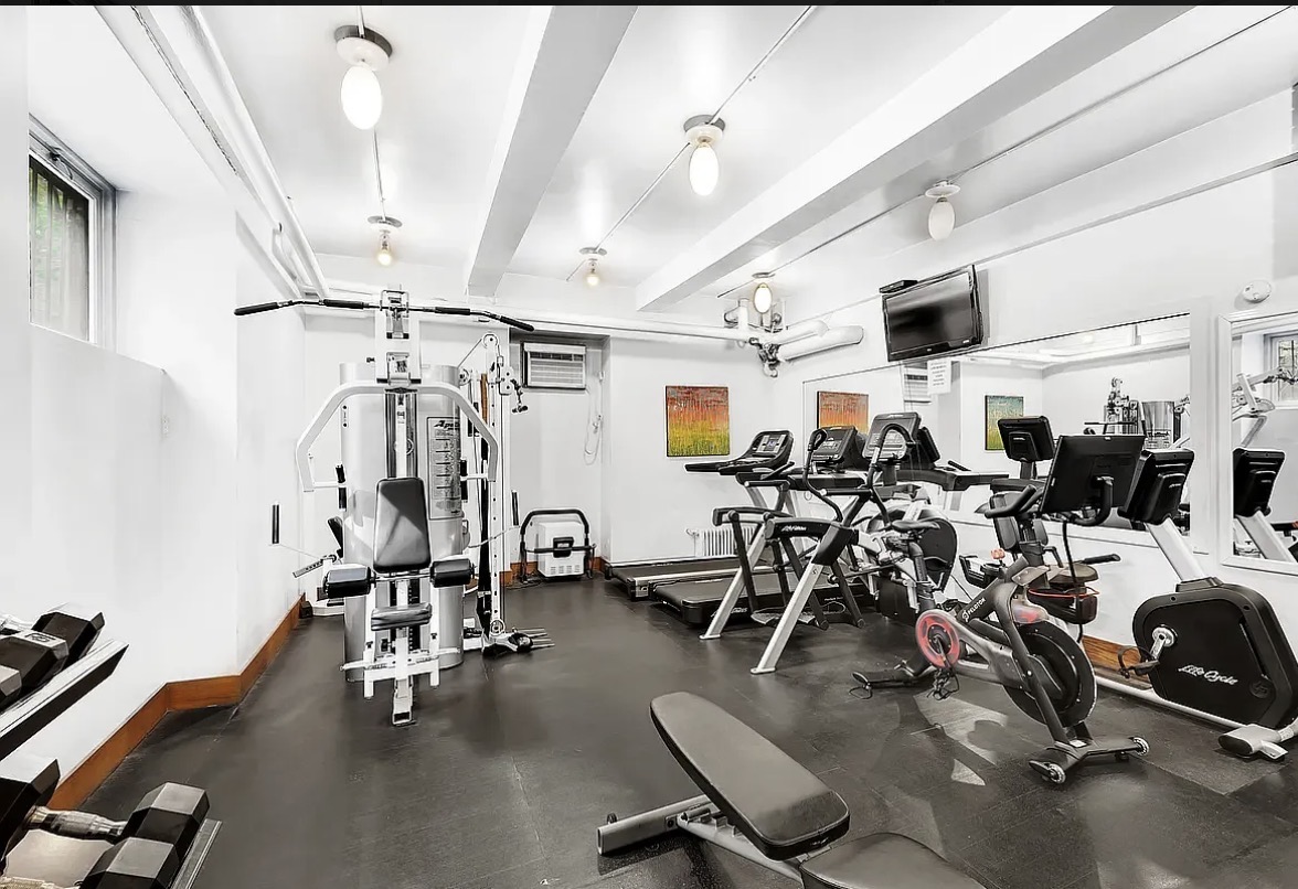 302 West 86th Street, Unit 11C Manhattan, NY 10024 - Photo 9 of 16 a view of a room with gym equipment