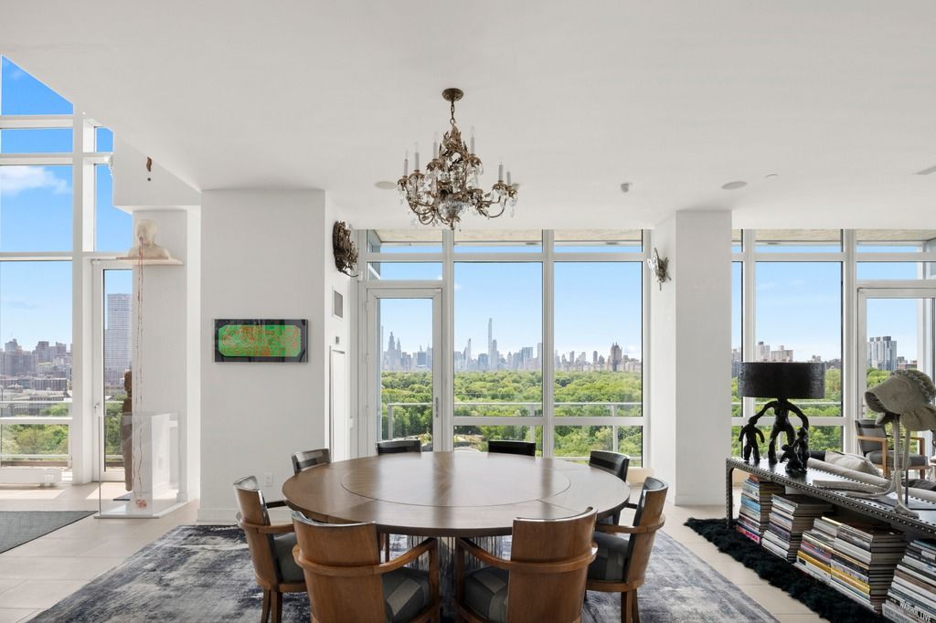 a dining room with furniture window wooden floor