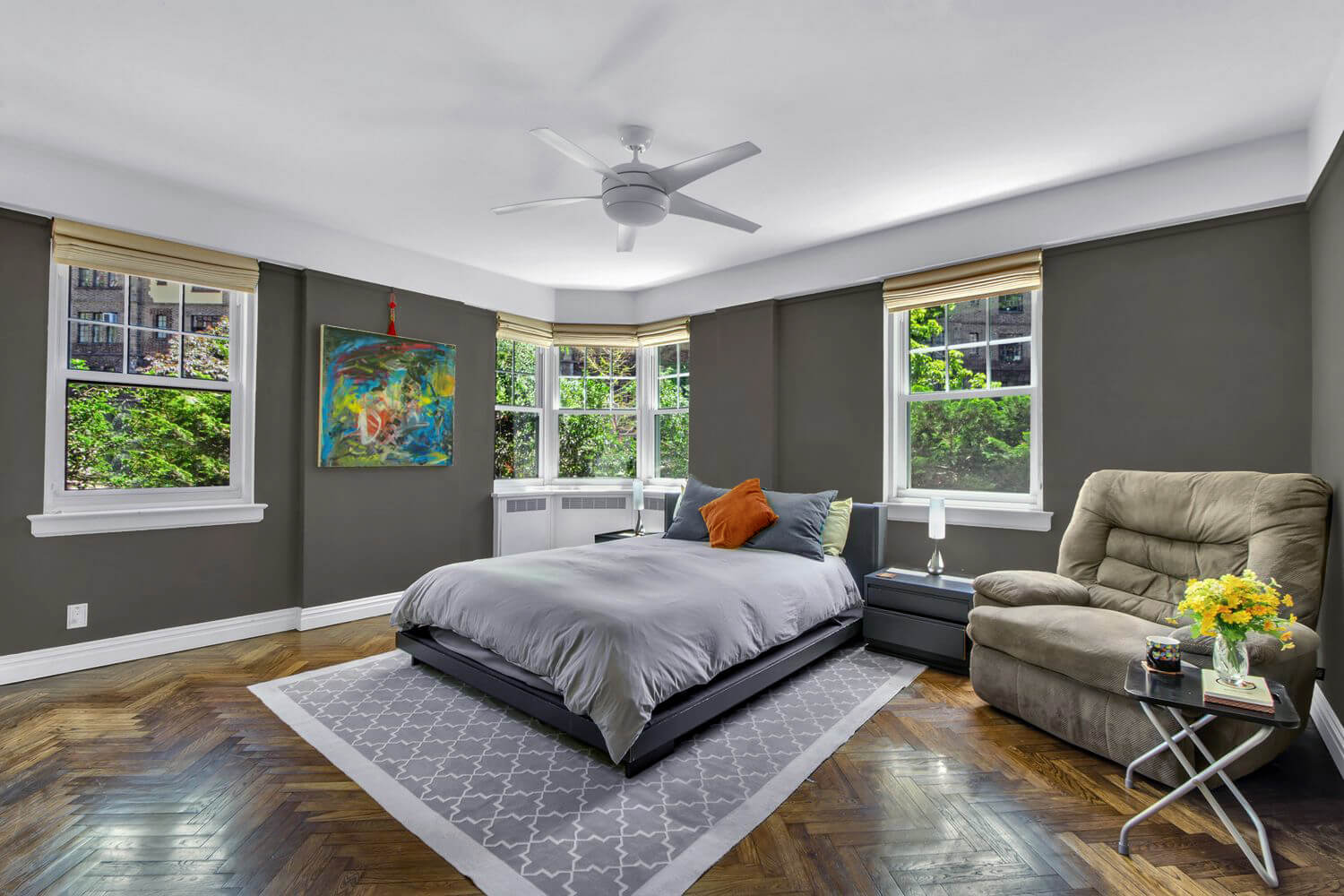 140 Cabrini Boulevard, Unit 14 Manhattan, NY 10033 - Photo 6 of 30 a bedroom with a bed and wooden floor