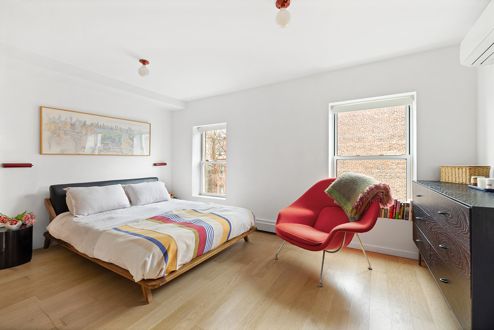 272 Putnam Avenue, Unit B Brooklyn, NY 11216 - Photo 6 of 13 a bedroom with a bed and a window