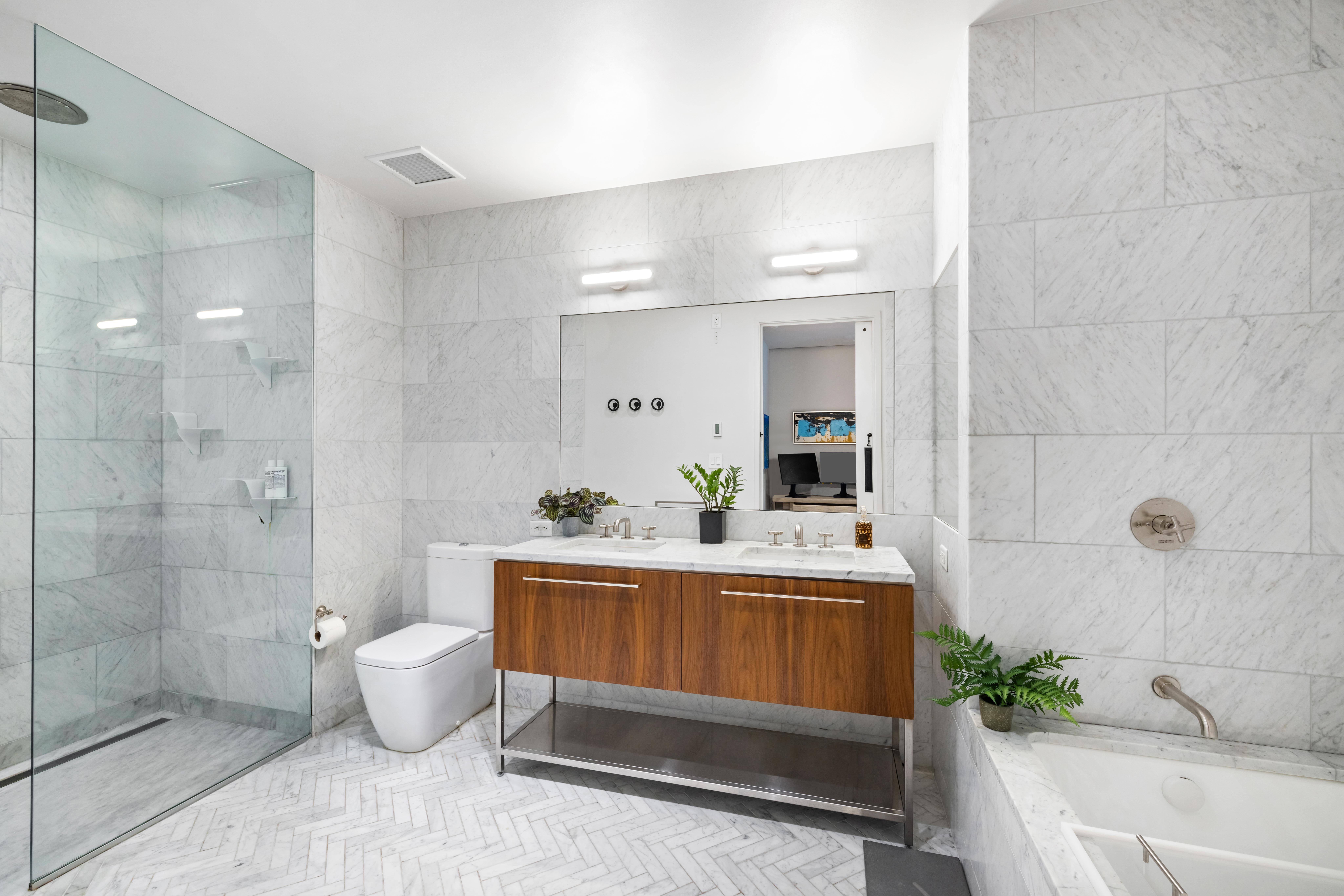 130 Furman Street, Unit S102 Brooklyn, NY 11201 - Photo 10 of 26 a bathroom with a sink a toilet and shower