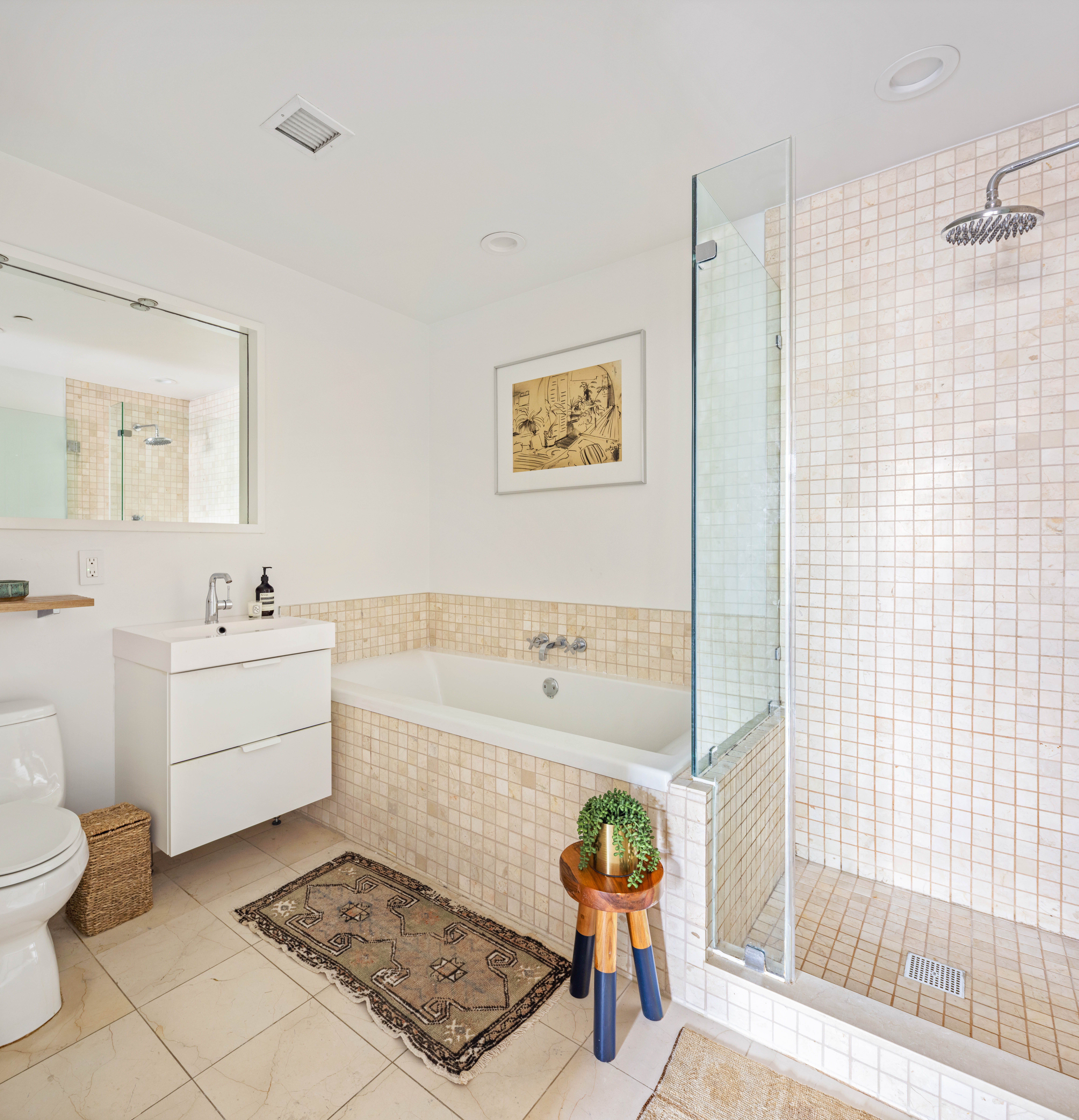 84 Front Street, Unit 8F Brooklyn, NY 11201 - Photo 7 of 12 a bathroom with a sink a toilet and shower