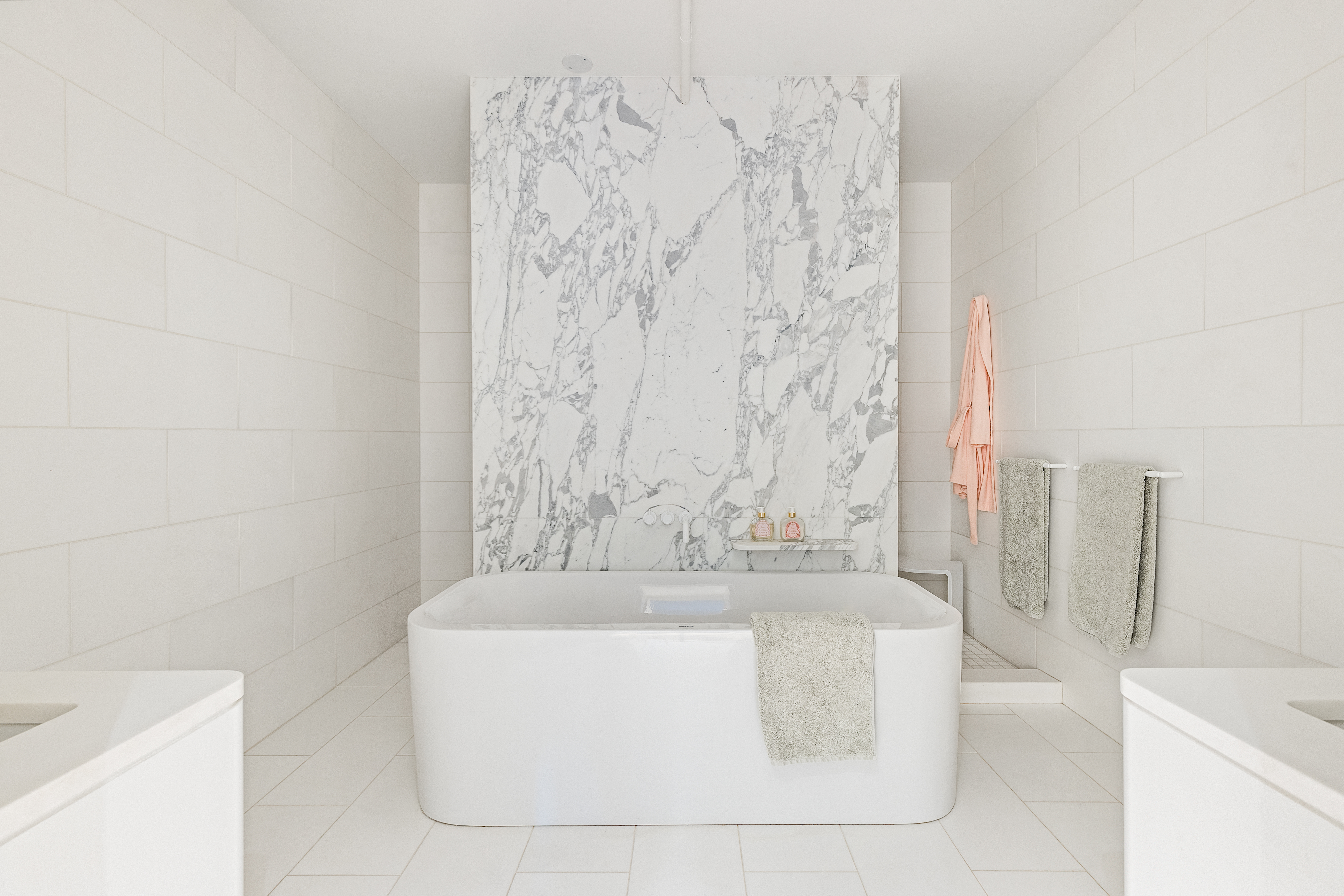 40 East 19th Street, Unit 7 Manhattan, NY 10003 - Photo 6 of 15 a bath tub sitting next to a white sink