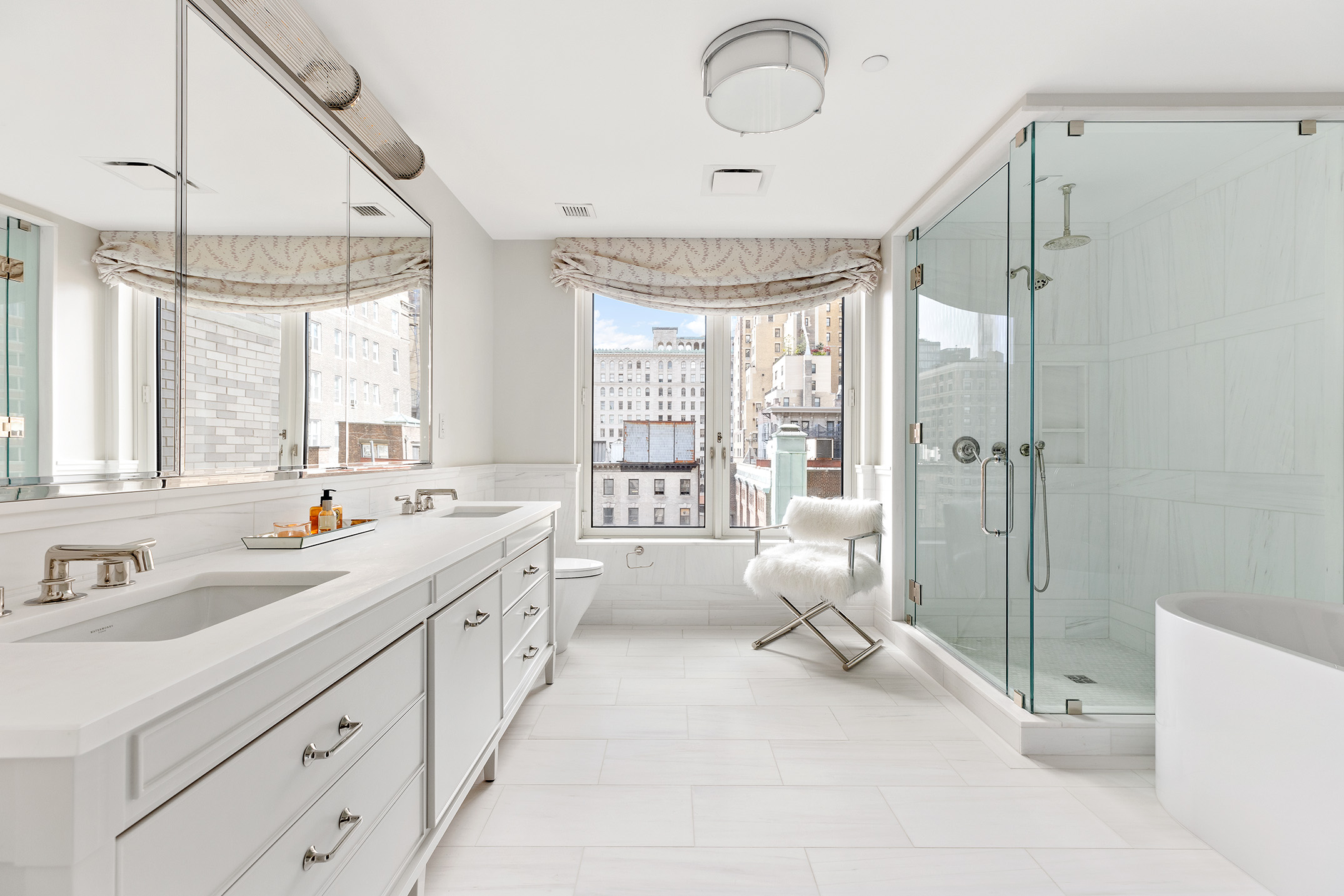 250 West 81st Street, Unit 8B Manhattan, NY 10024 - Photo 9 of 19 a spacious bathroom with double vanity and a shower