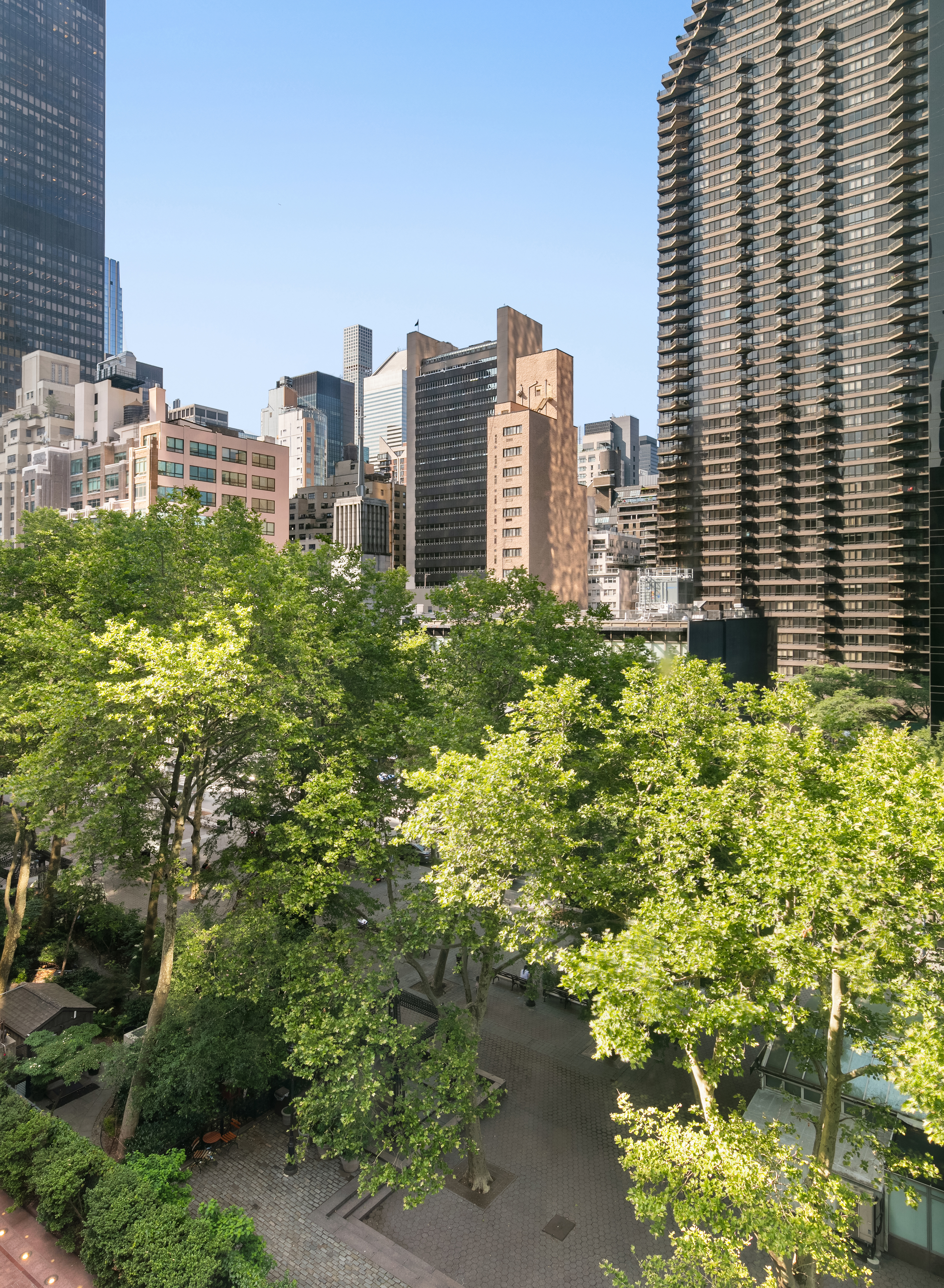 50 United Nations Plaza, Unit 6C Manhattan, NY 10017 - Photo 8 of 15 a view of a city with tall buildings