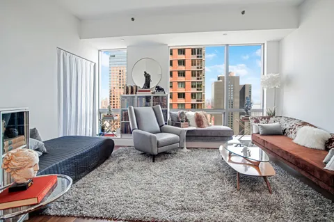 a living room with furniture and a couch