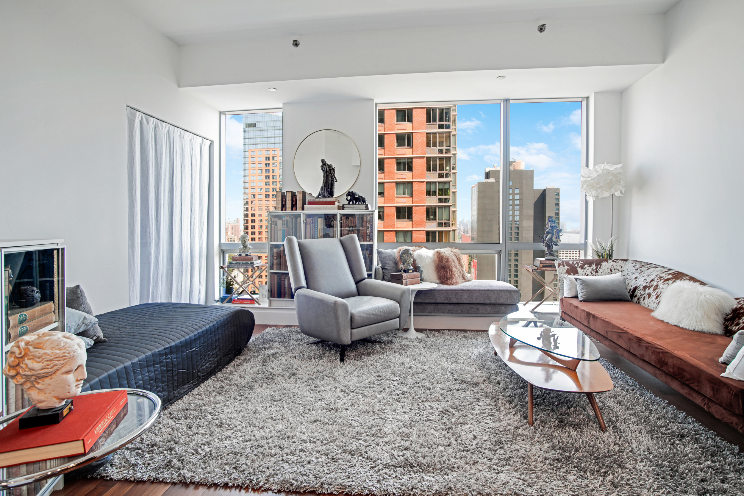 a living room with furniture and a couch