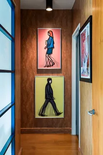 a room with painting and a painting on a wall