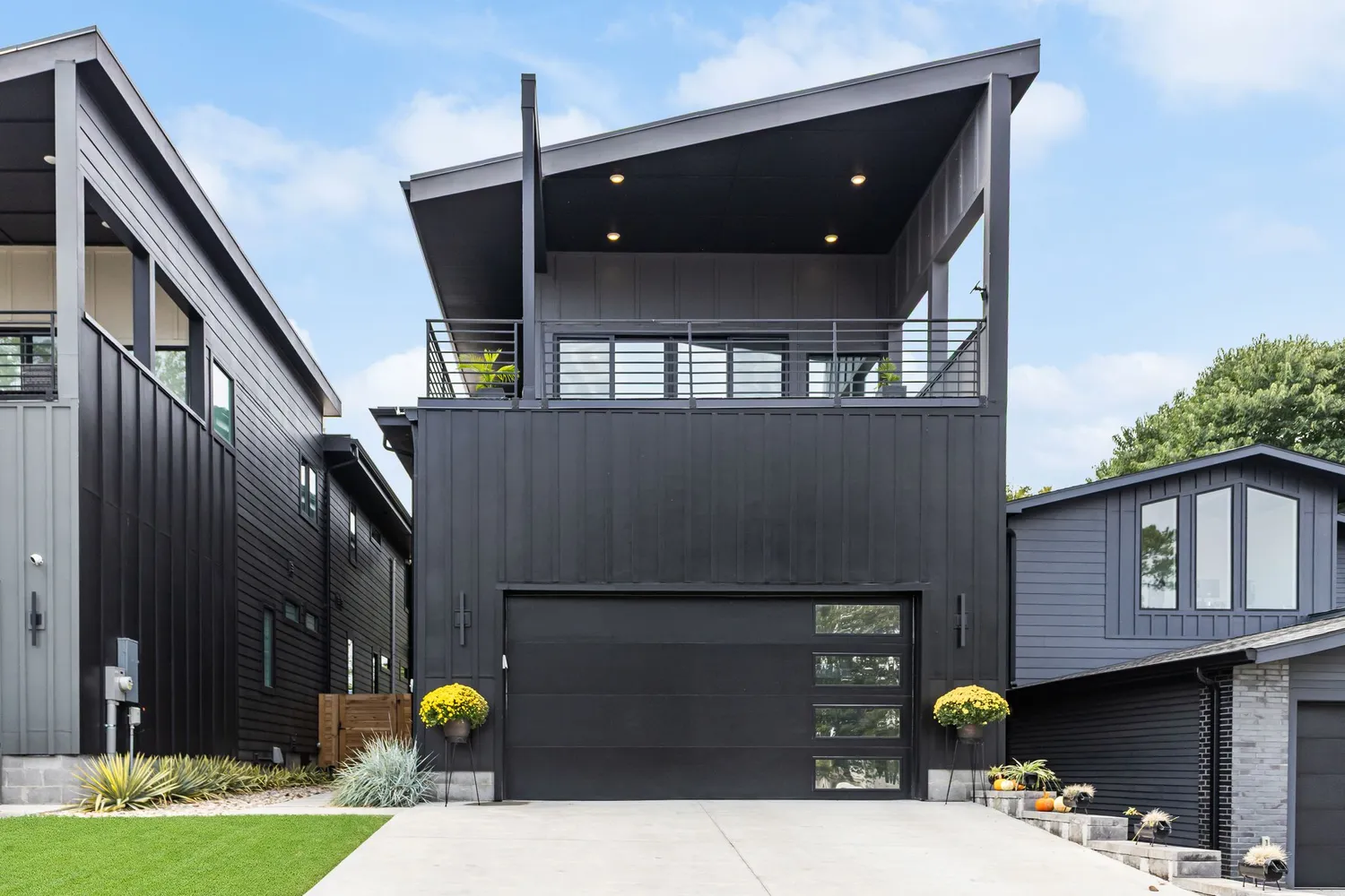 a side view of a house with a patio
