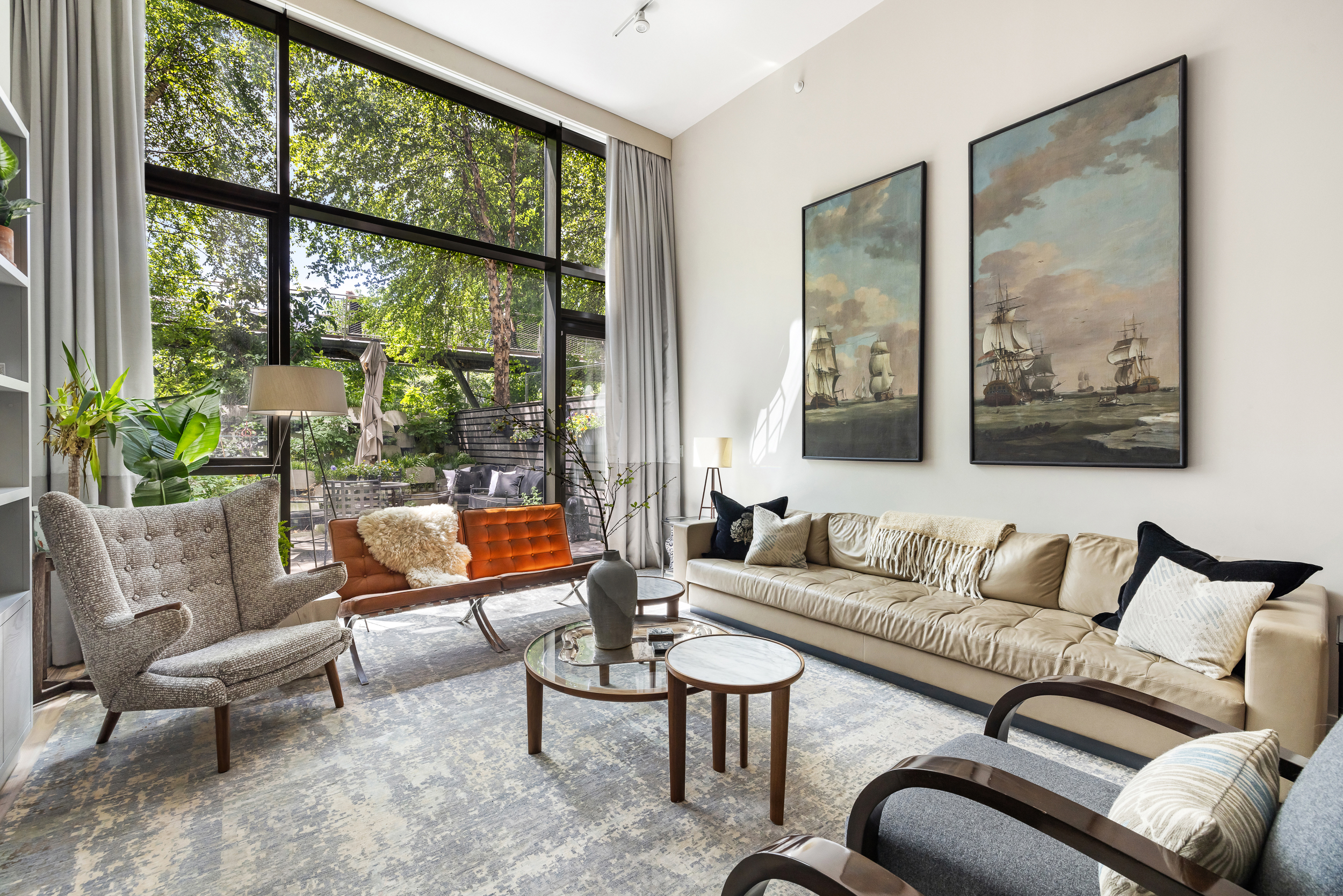 90 Furman Street, Unit N107 Brooklyn, NY 11201 - Photo 6 of 30 a living room with furniture and a large window