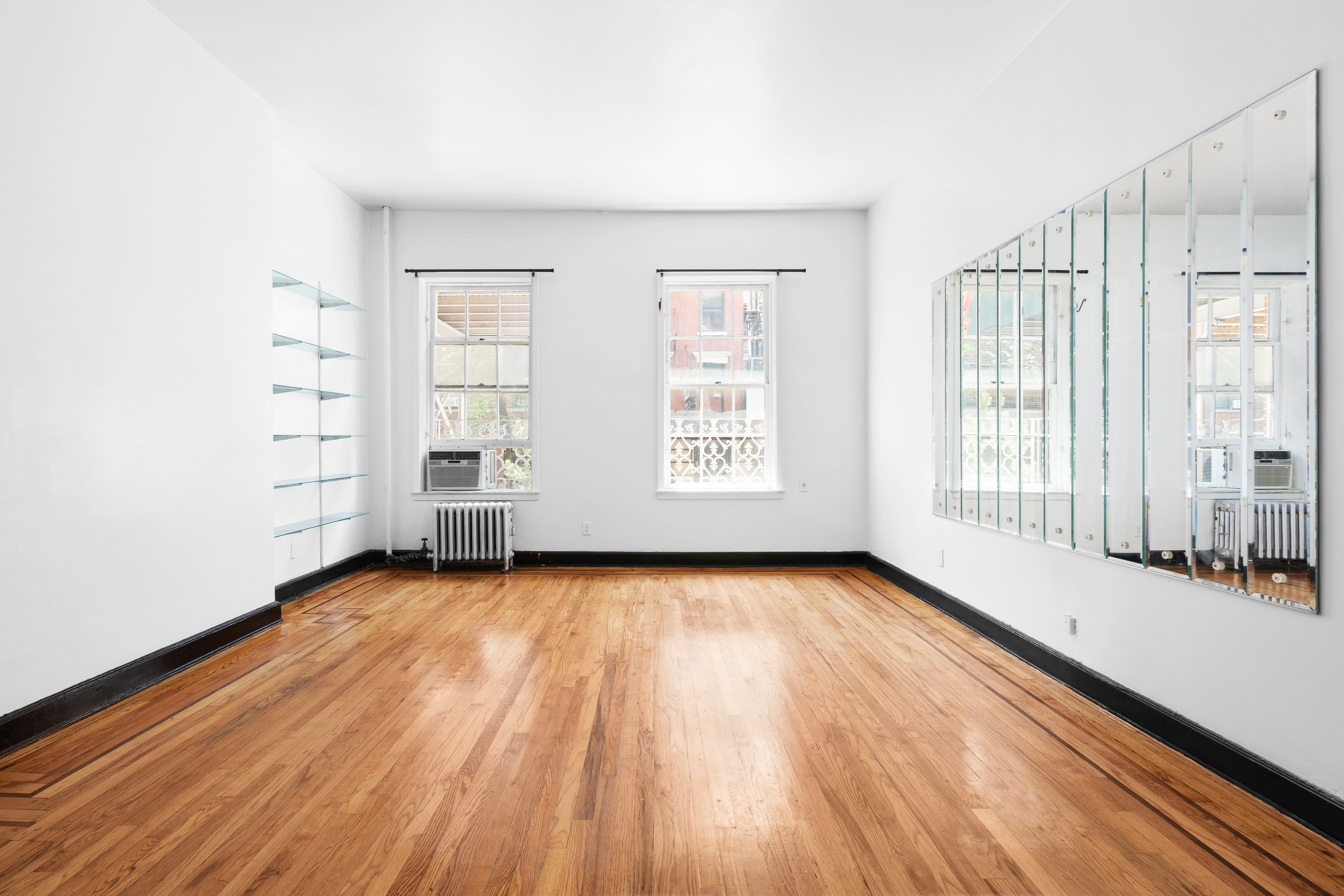 an empty room with windows