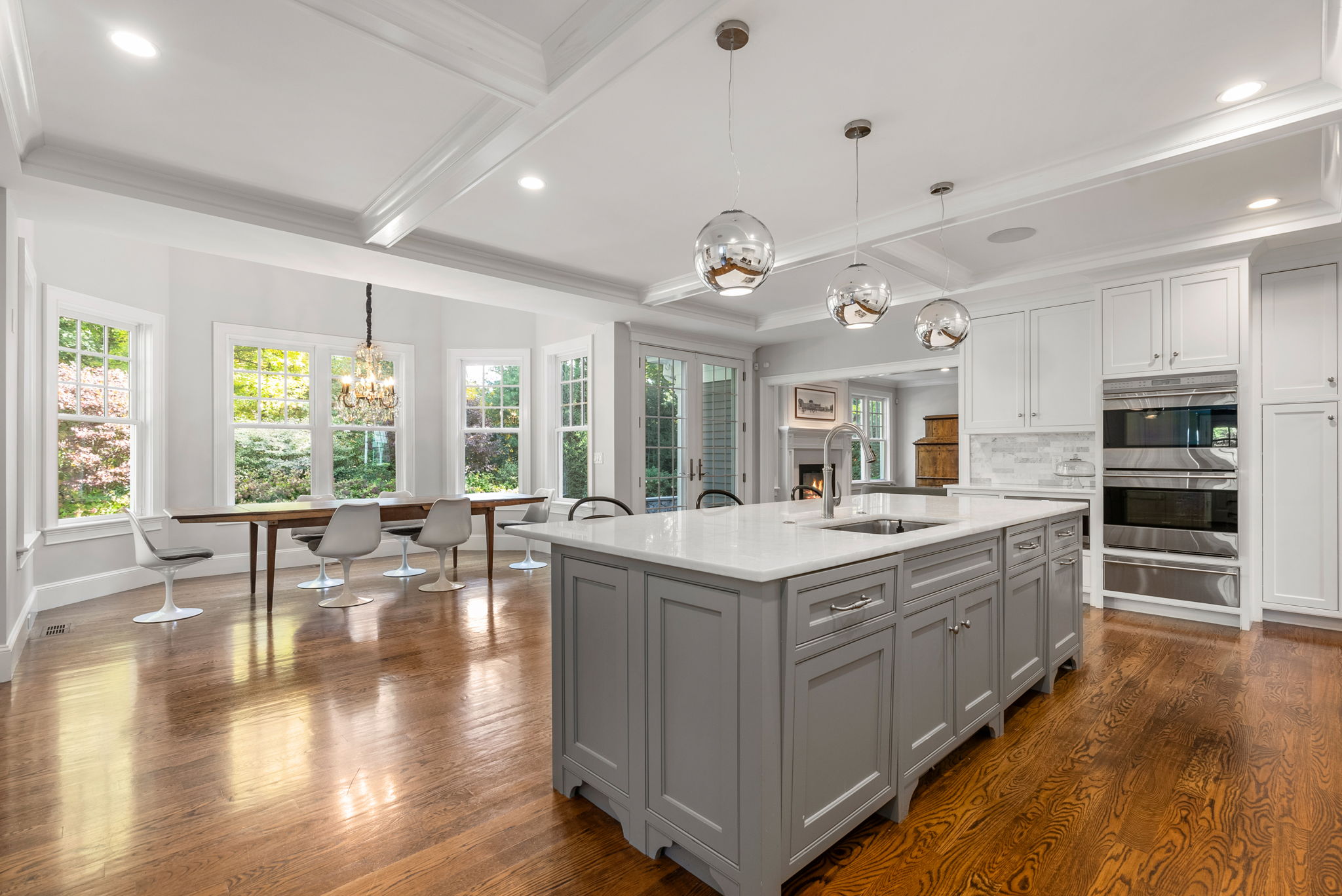 9 Wynnewood Road Wellesley Hills, MA 02481 - Photo 4 of 27 a large kitchen with a large window and stainless steel appliances