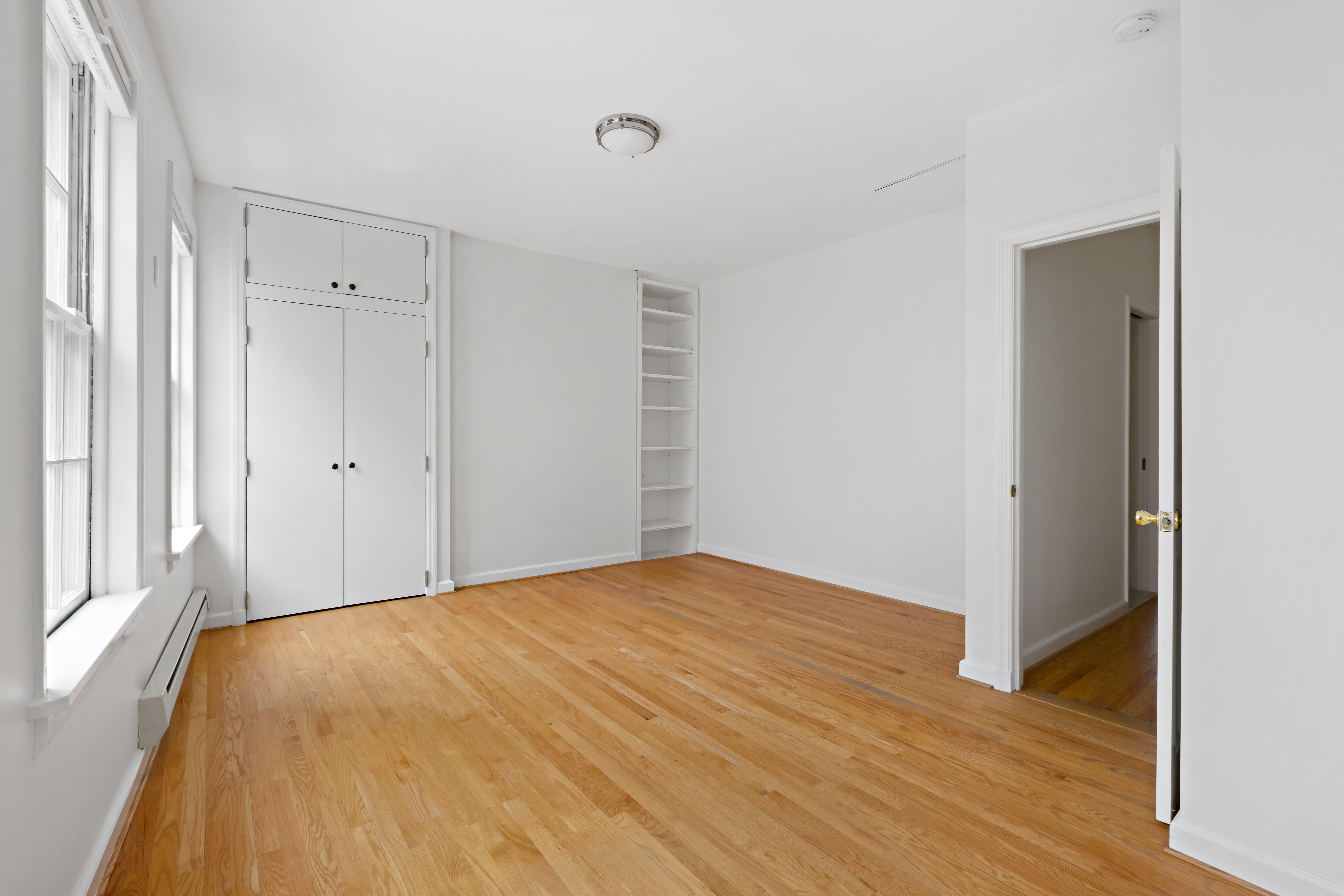10 Bedford Street Manhattan, NY 10014 - Photo 15 of 29 a view of an empty room and wooden floor