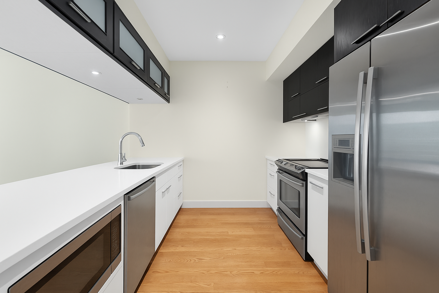 658 Bergen Street, Unit 3E Brooklyn, NY 11238 - Photo 3 of 8 a kitchen with stainless steel appliances a sink and a refrigerator