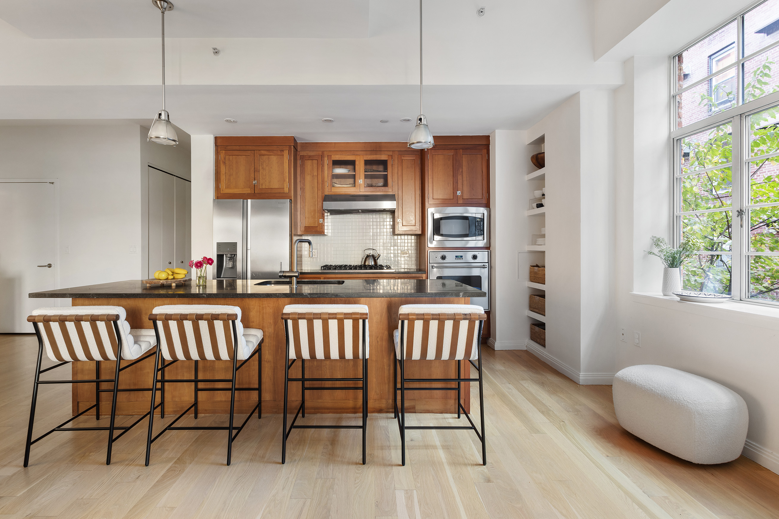 9 College Place, Unit 2K Brooklyn, NY 11201 - Photo 5 of 17 a view of a dining room with furniture window and wooden floor