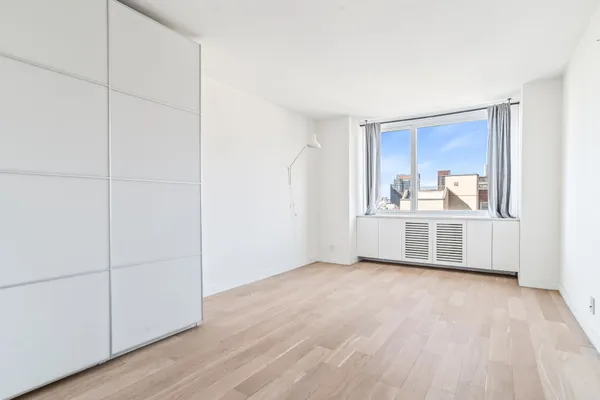 a view of a livingroom with wooden floor