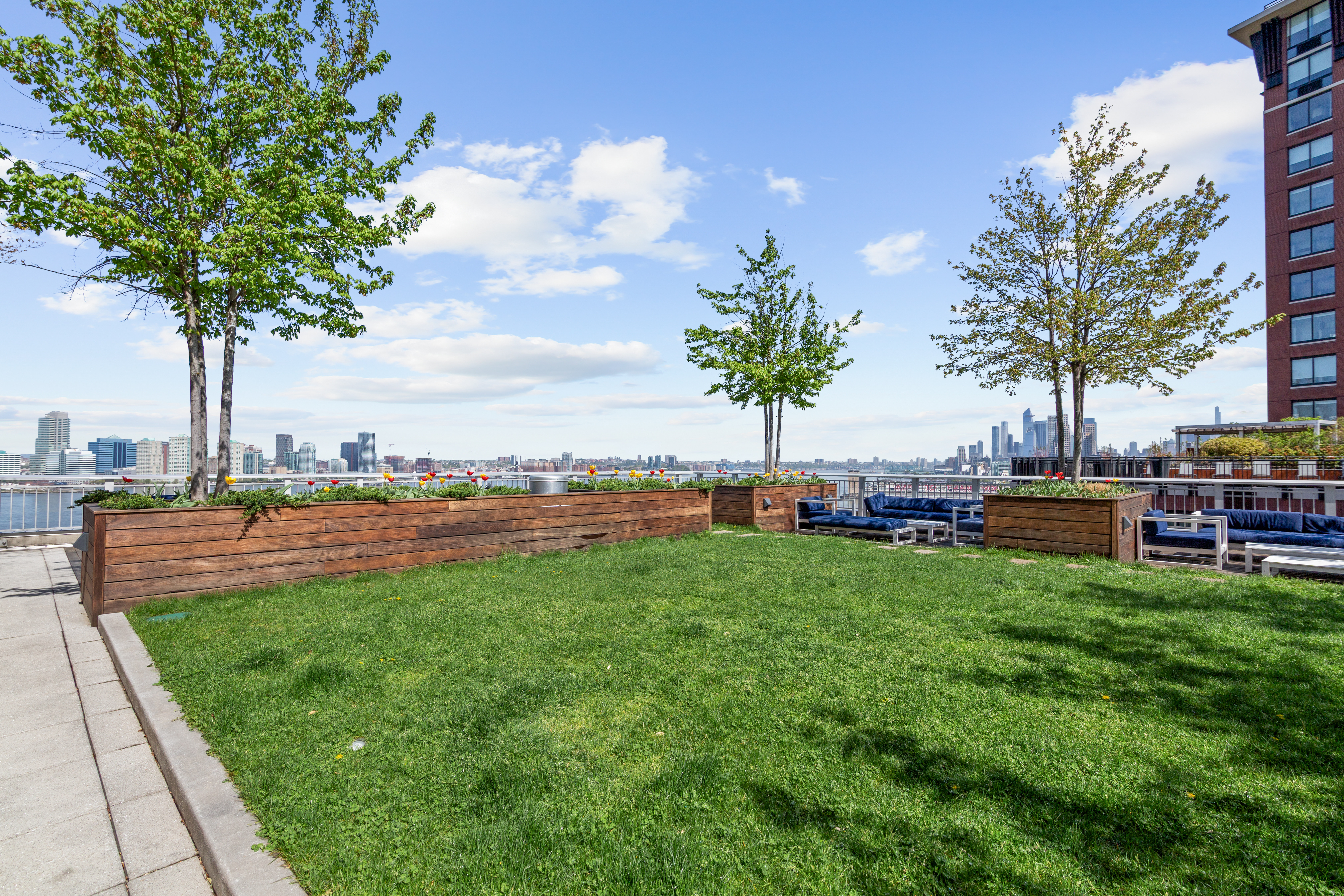 212 Warren Street, Unit 3B Manhattan, NY 10282 - Photo 10 of 11 a view of a garden