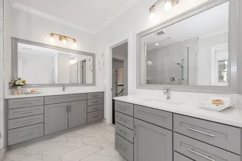 a living room with furniture a rug and a book shelf